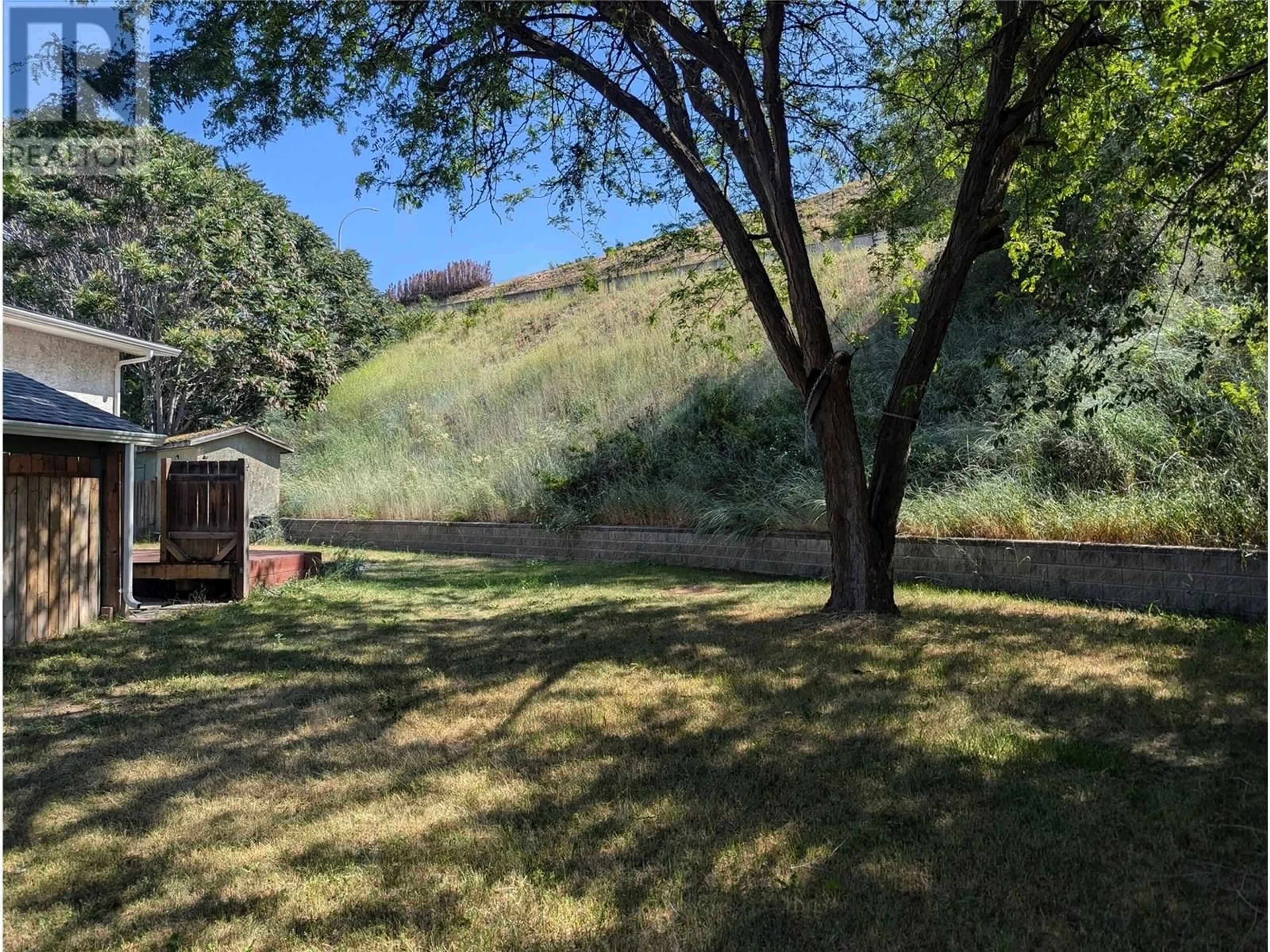 A pic from outside/outdoor area/front of a property/back of a property/a pic from drone, mountain view for 1087 MONTEREY COURT, Kelowna British Columbia V1X5P2