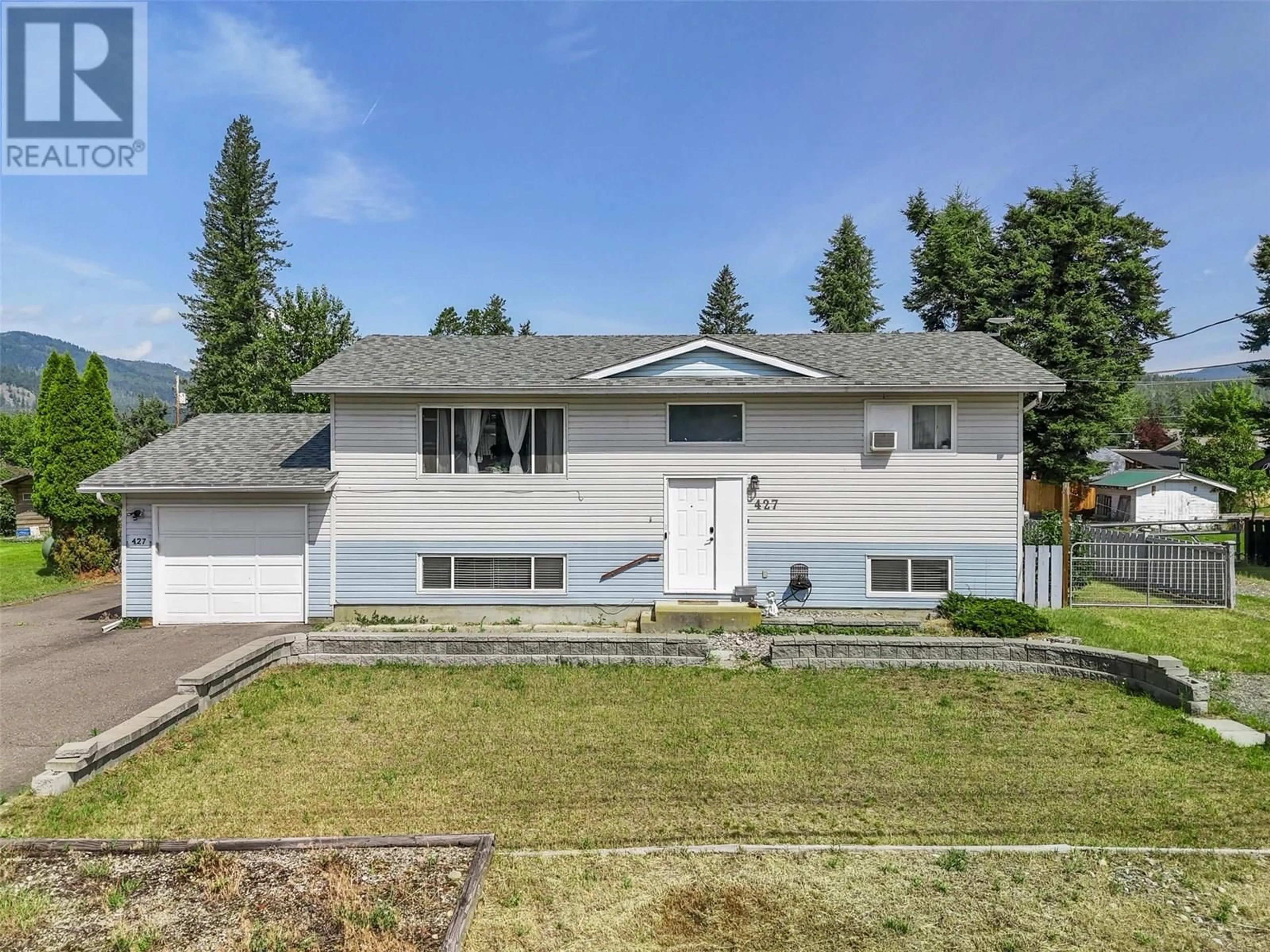 Home with vinyl exterior material, street for 427 ROBIN DRIVE, Barriere British Columbia V0E1E0