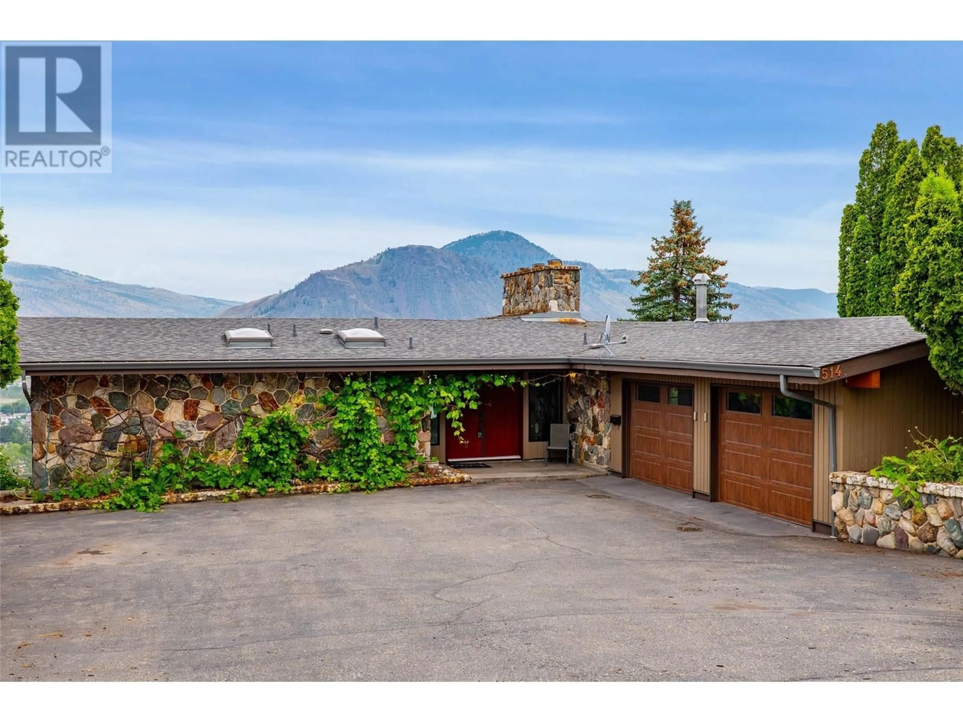 A pic from outside/outdoor area/front of a property/back of a property/a pic from drone, mountain view for 514 STRATHCONA TERRACE, Kamloops British Columbia V2C1B9