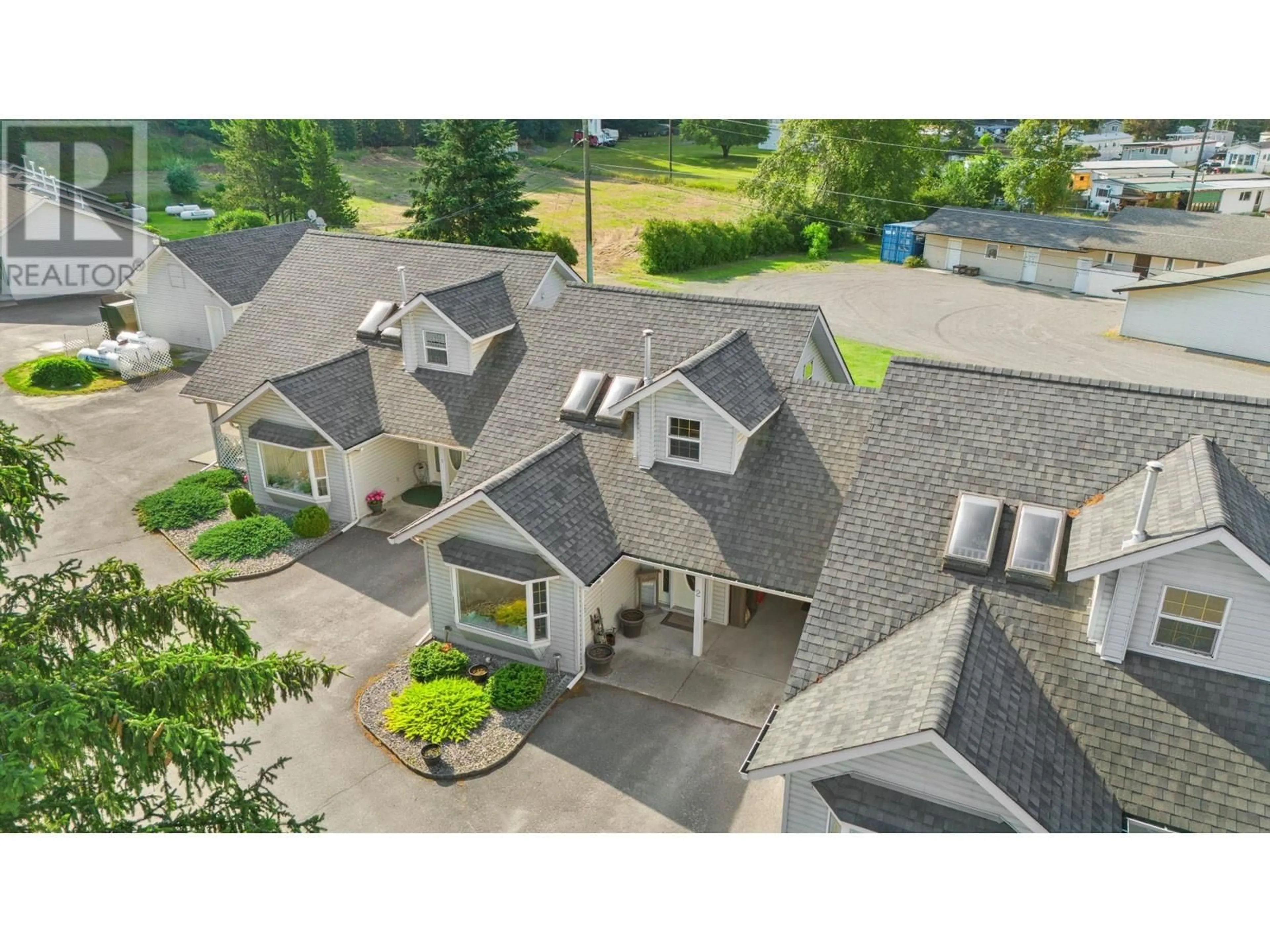 A pic from outside/outdoor area/front of a property/back of a property/a pic from drone, street for 2 - 4476 BARRIERE TOWNE ROAD, Barriere British Columbia V0E1E0
