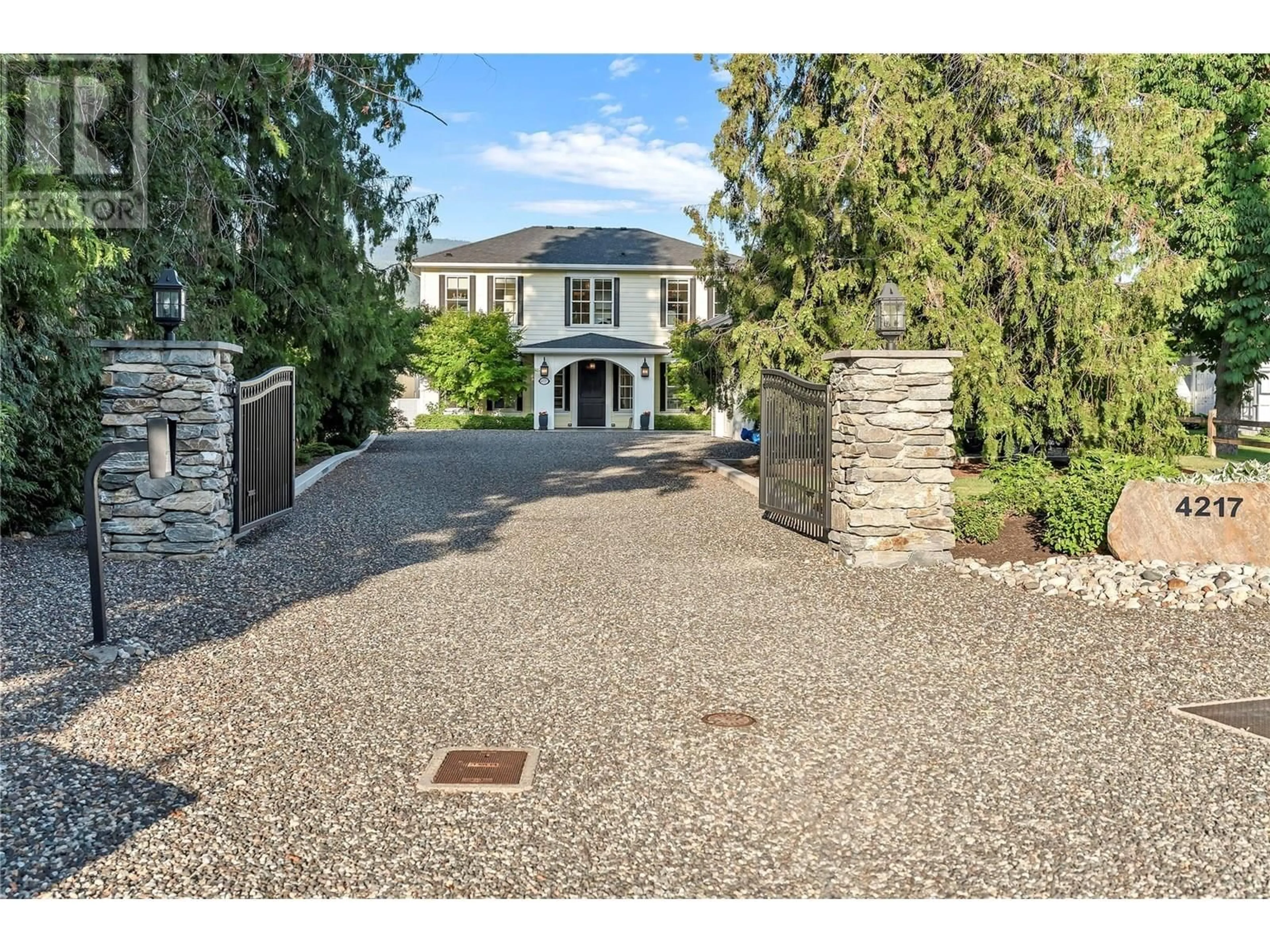 A pic from outside/outdoor area/front of a property/back of a property/a pic from drone, street for 4217 WILLIAMS AVENUE, Summerland British Columbia V0H1Z0