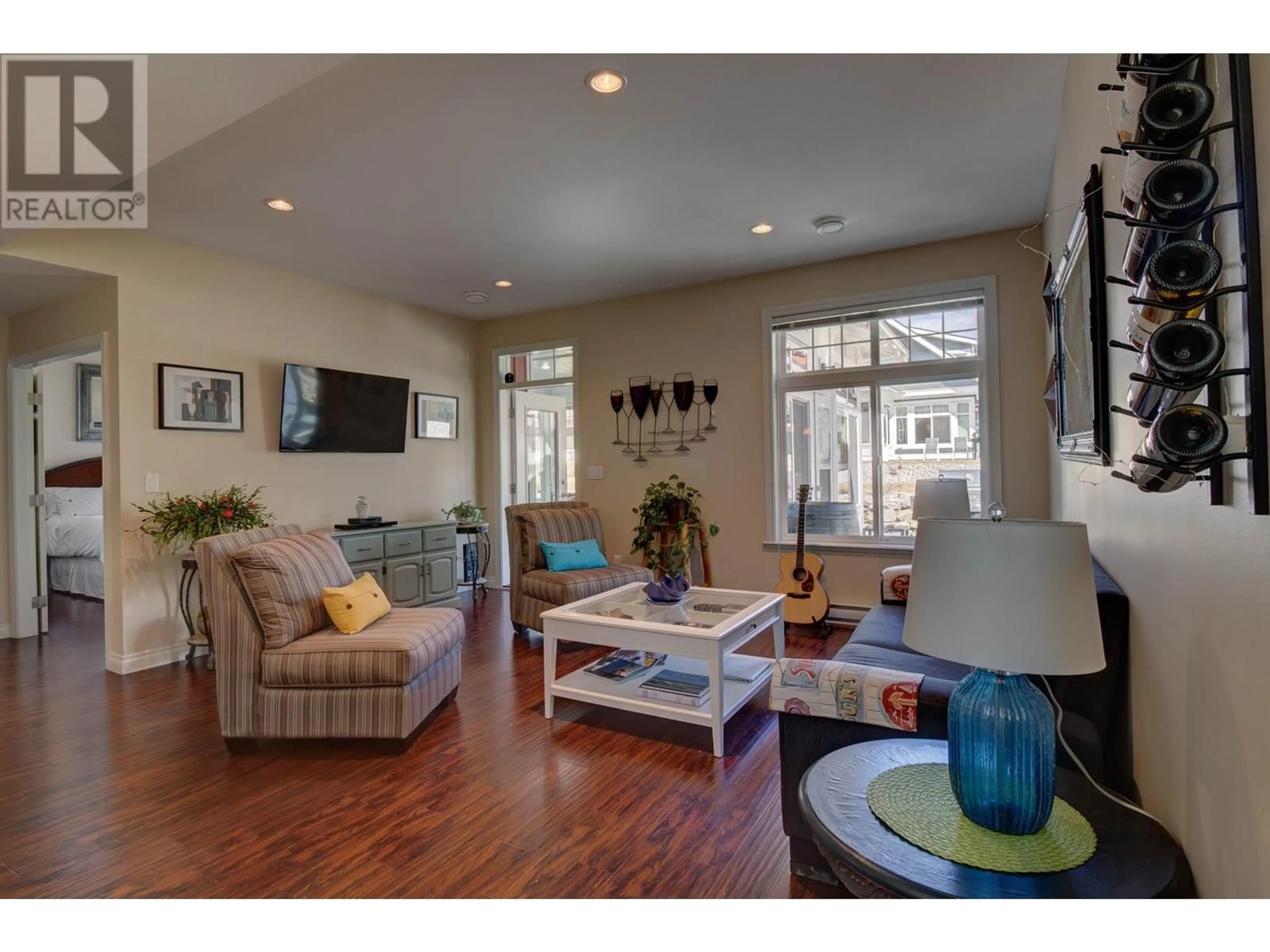 Living room with furniture, wood/laminate floor for 31 - 2450 RADIO TOWER ROAD, Oliver British Columbia V0H1T1