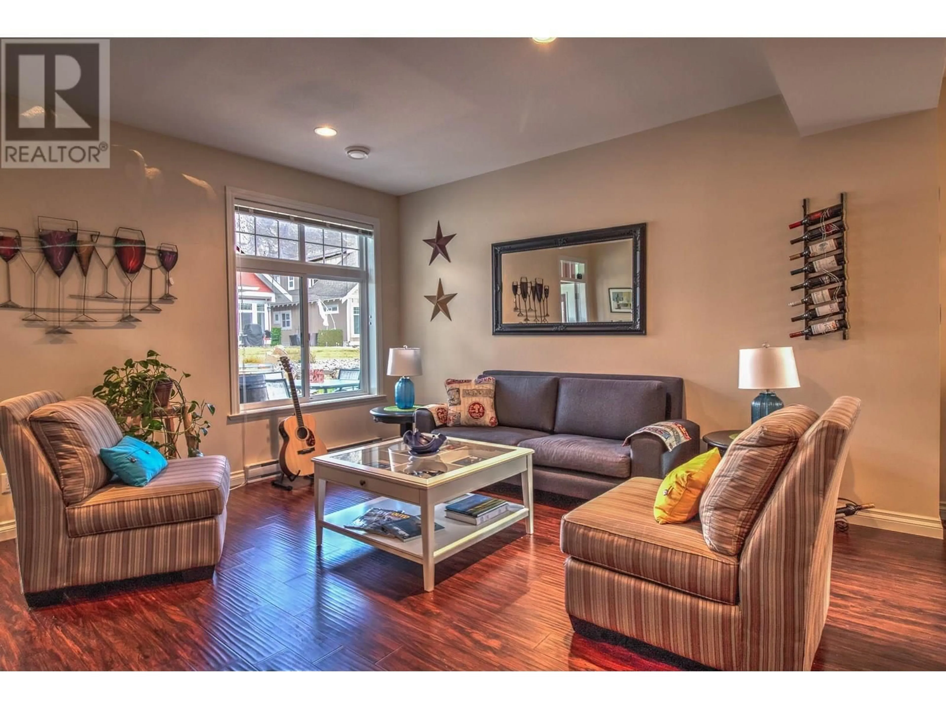 Living room with furniture, wood/laminate floor for 31 - 2450 RADIO TOWER ROAD, Oliver British Columbia V0H1T1