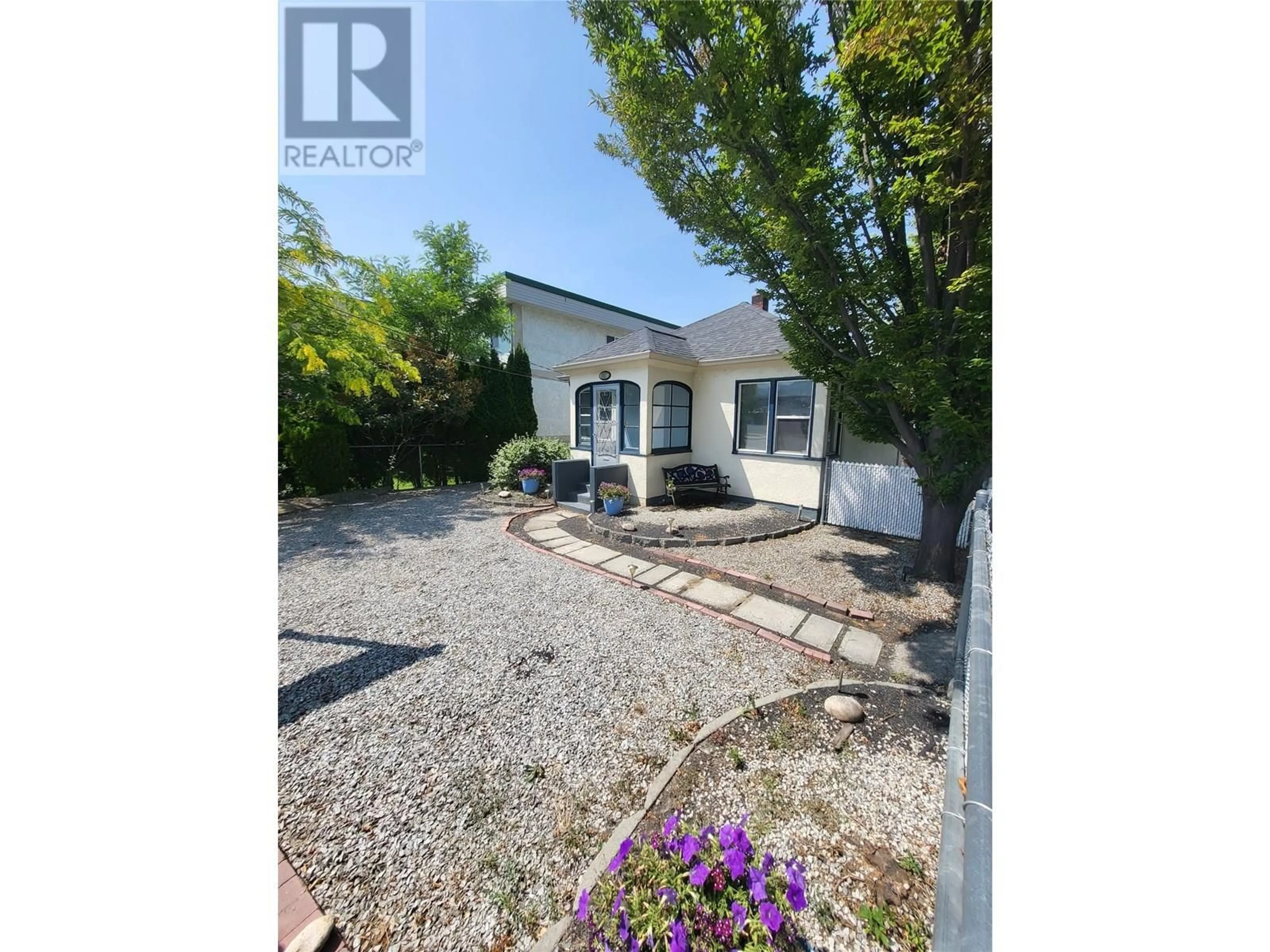 A pic from outside/outdoor area/front of a property/back of a property/a pic from drone, street for 857 MAIN STREET, Penticton British Columbia V2A5E3
