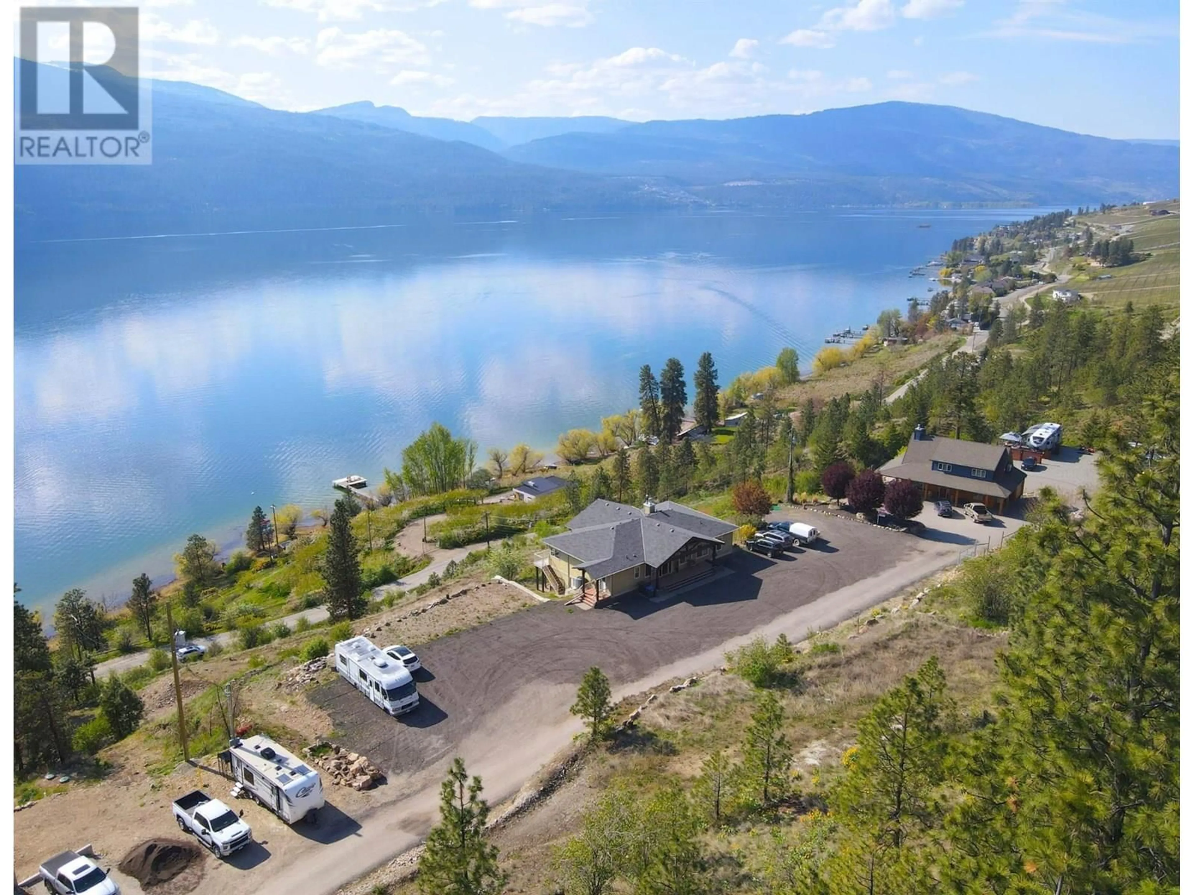 A pic from outside/outdoor area/front of a property/back of a property/a pic from drone, water/lake/river/ocean view for 13938 MOBERLY ROAD, Lake Country British Columbia V4V1A6