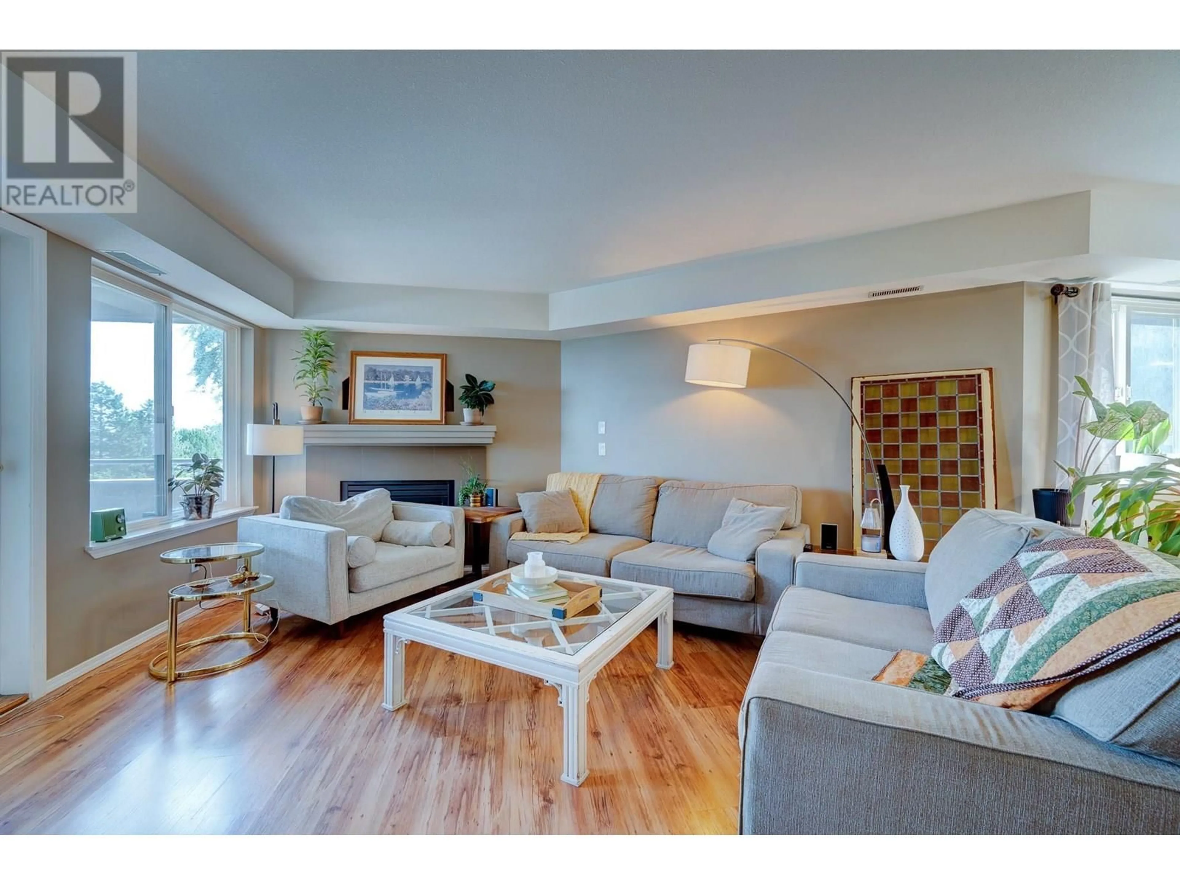 Living room with furniture, wood/laminate floor for 105 - 1185 HUGH ALLAN DRIVE, Kamloops British Columbia V1S1T3