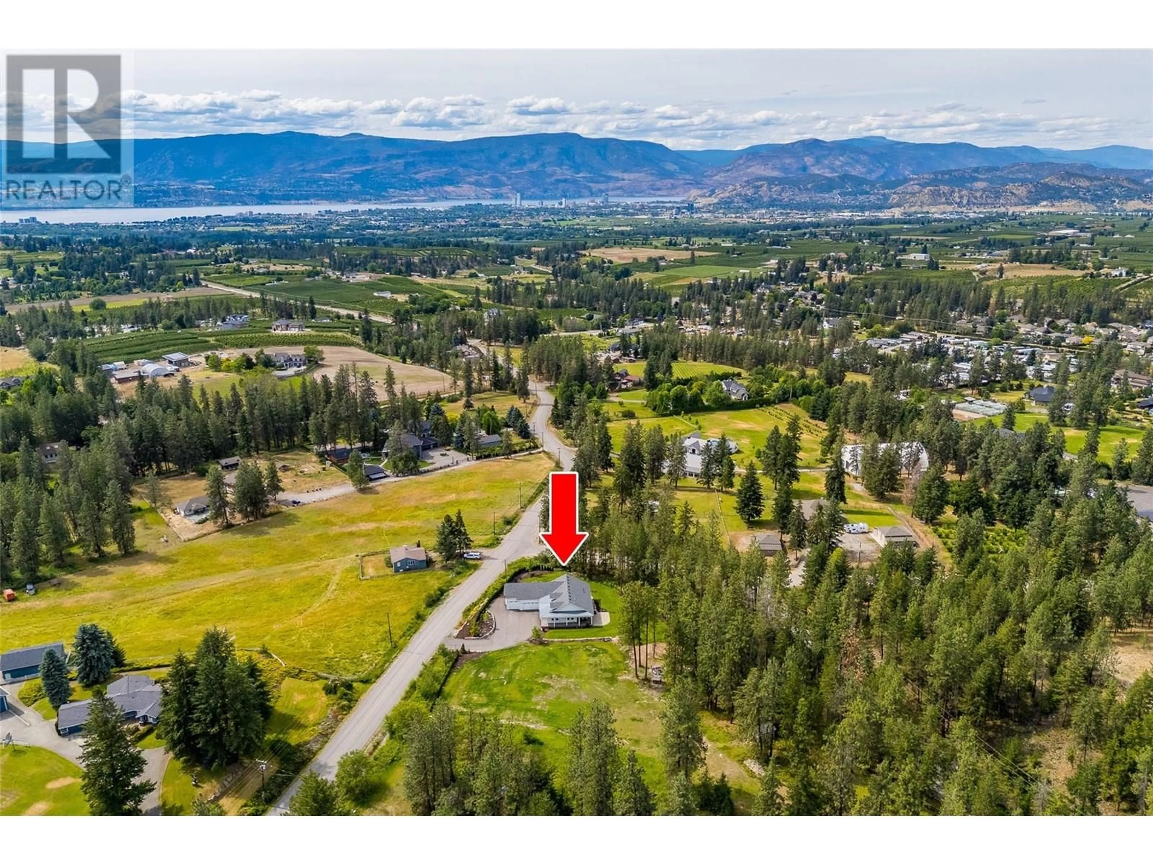 A pic from outside/outdoor area/front of a property/back of a property/a pic from drone, mountain view for 4135 JUNE SPRINGS ROAD, Kelowna British Columbia V1W4C9