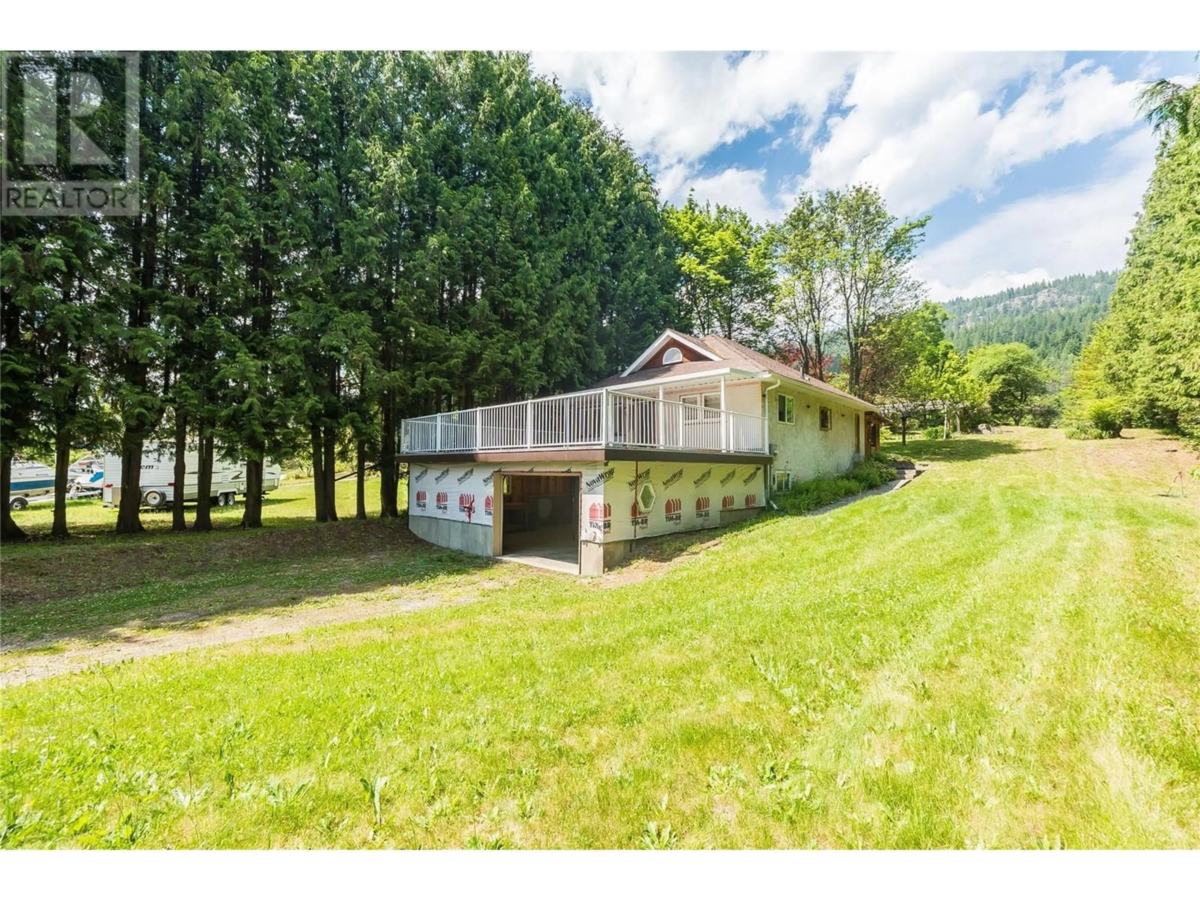 A pic from outside/outdoor area/front of a property/back of a property/a pic from drone, water/lake/river/ocean view for 3253 BROADWATER ROAD, Castlegar British Columbia V0G1X0