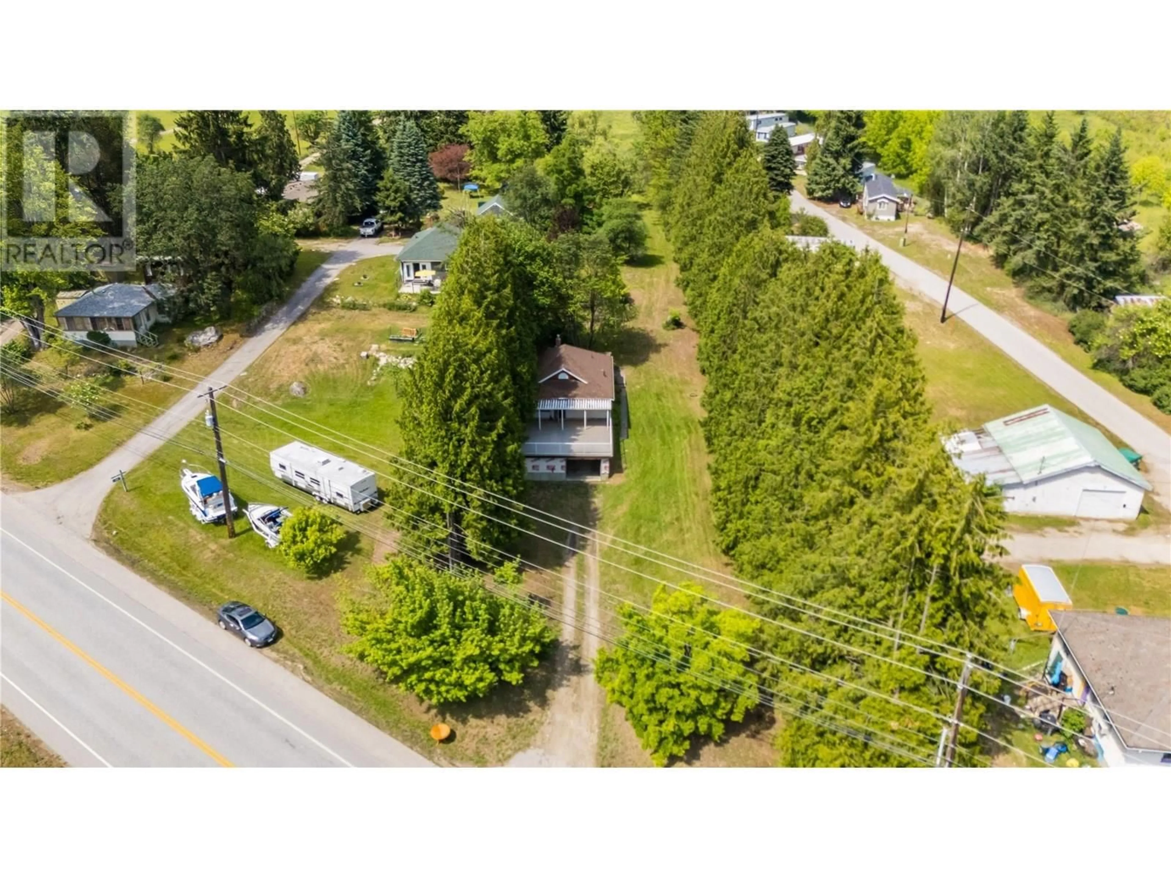 A pic from outside/outdoor area/front of a property/back of a property/a pic from drone, unknown for 3253 BROADWATER ROAD, Castlegar British Columbia V0G1X0