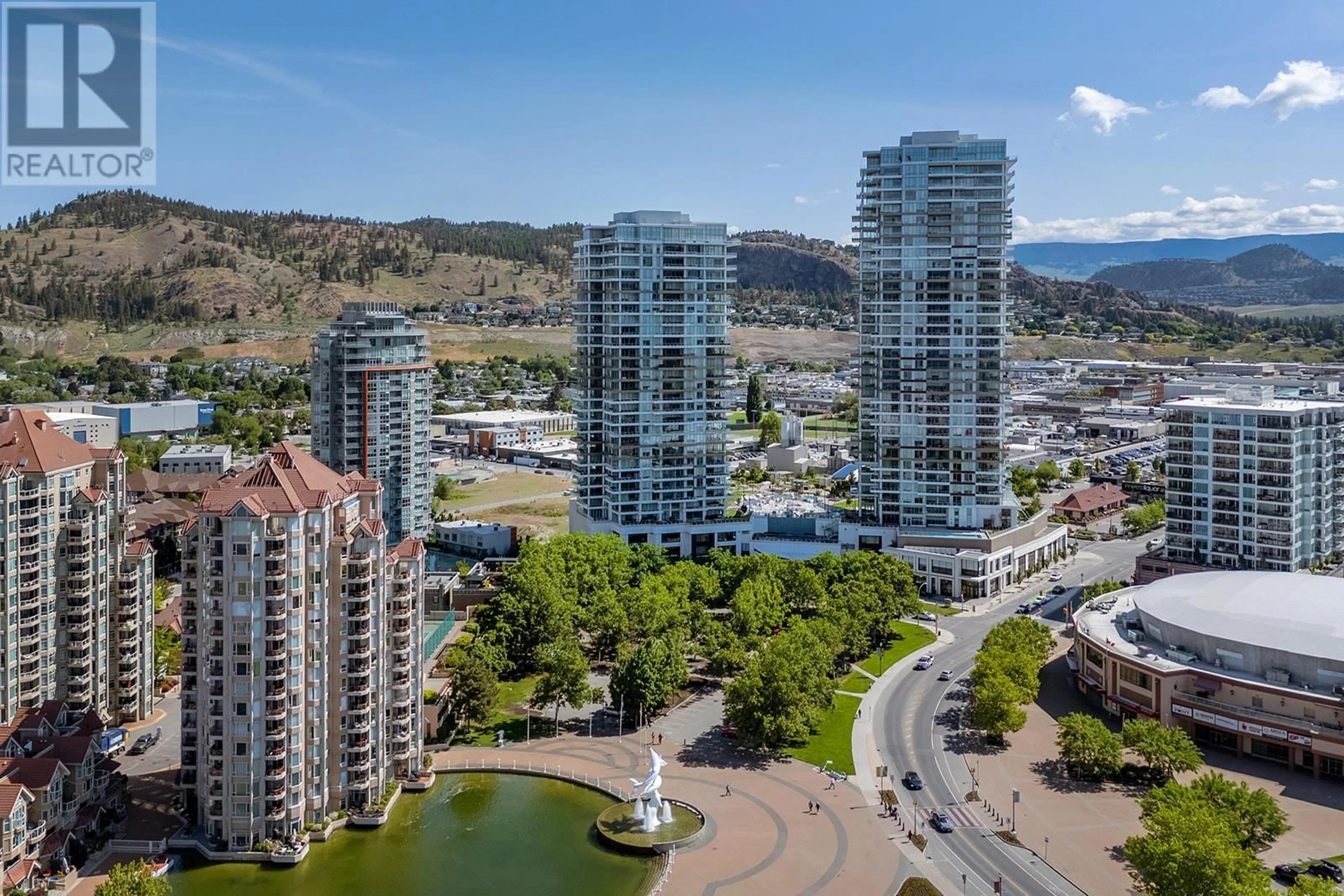 A pic from outside/outdoor area/front of a property/back of a property/a pic from drone, city buildings view from balcony for 1402 - 1181 SUNSET DRIVE, Kelowna British Columbia V1Y0L4