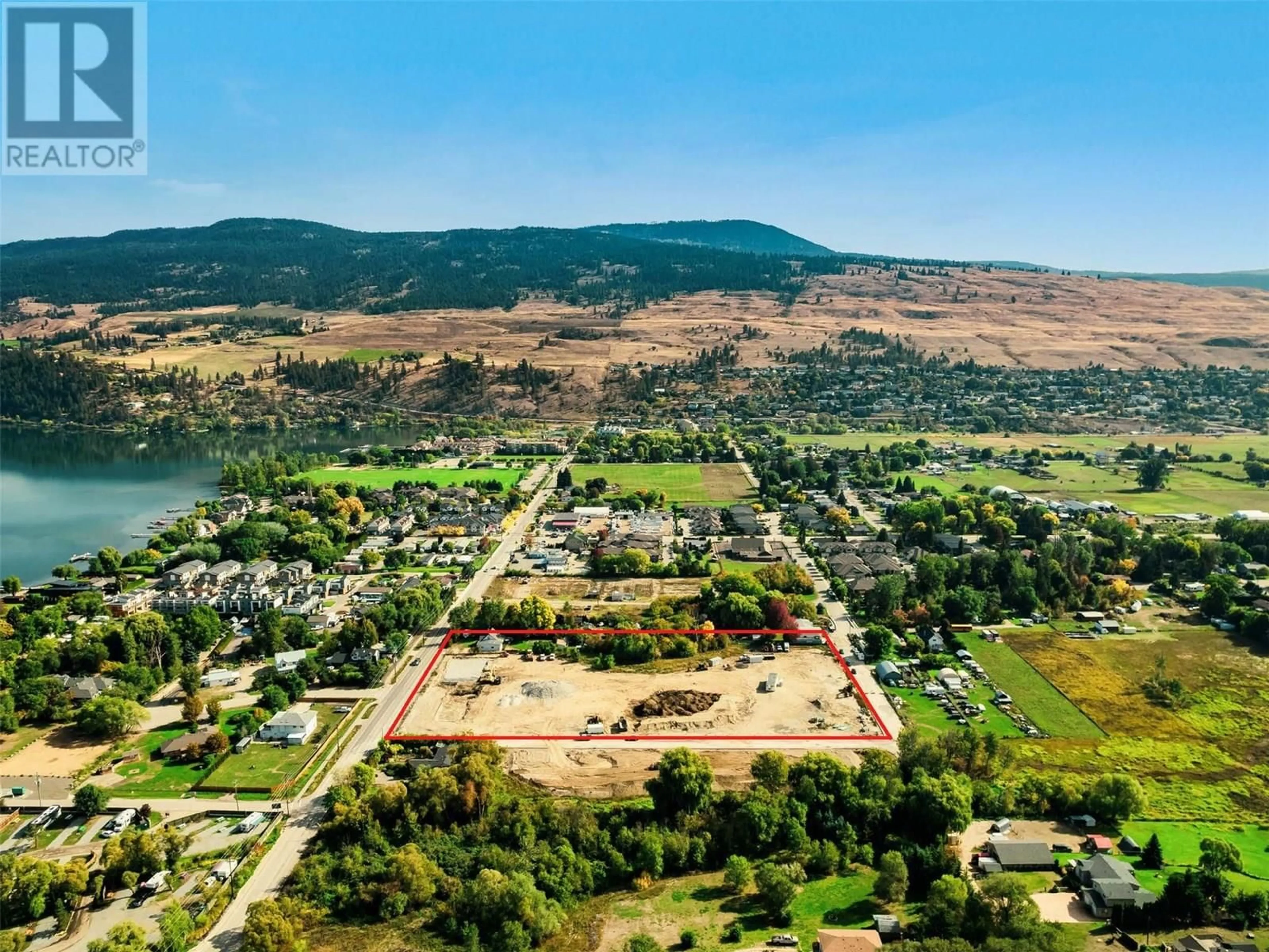 A pic from outside/outdoor area/front of a property/back of a property/a pic from drone, water/lake/river/ocean view for 3 - 11451 ETHERIDGE ROAD, Lake Country British Columbia V4V0C3