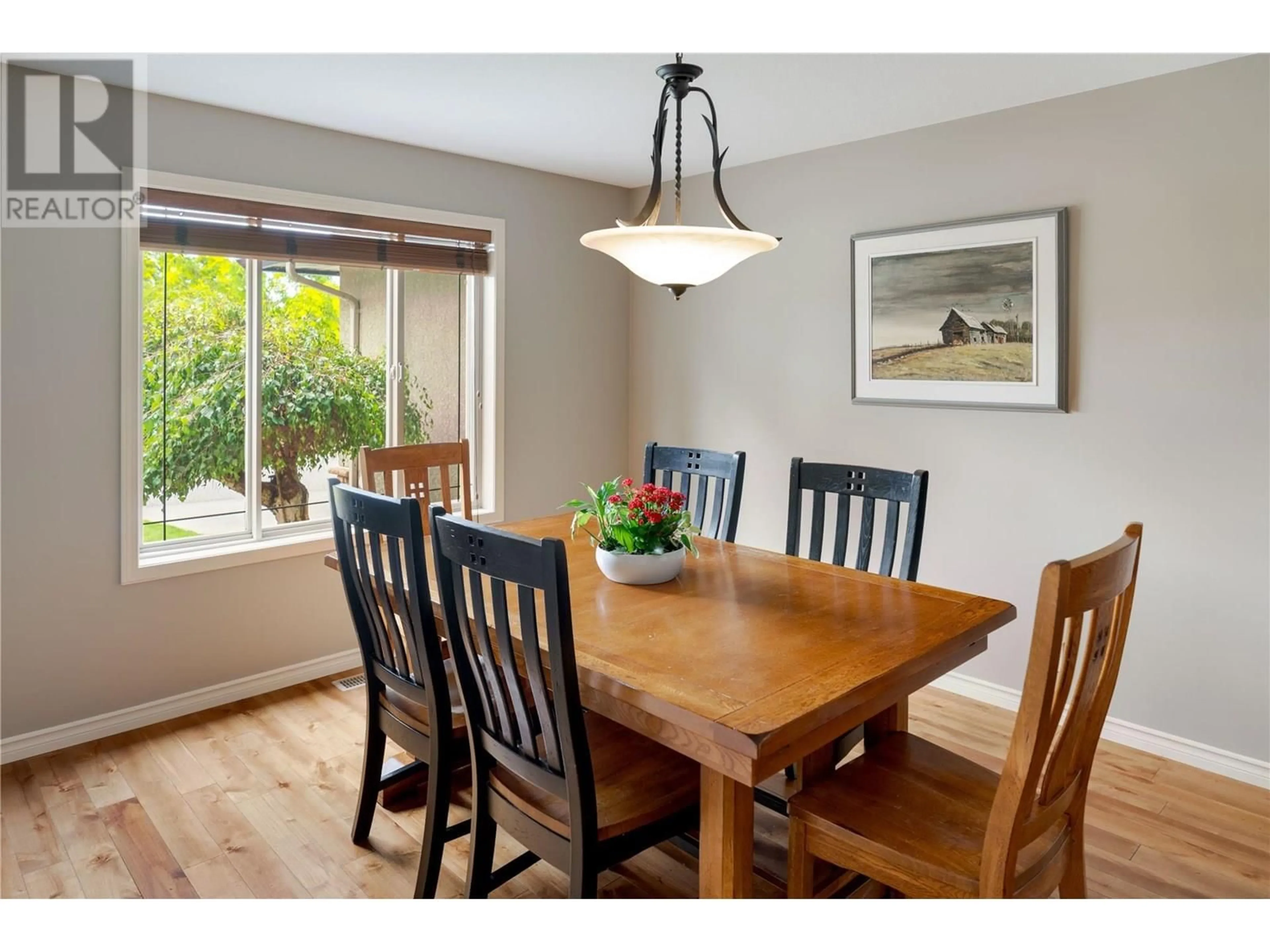 Dining room, wood/laminate floor for 2464 SELKIRK DRIVE, Kelowna British Columbia V1V2R7