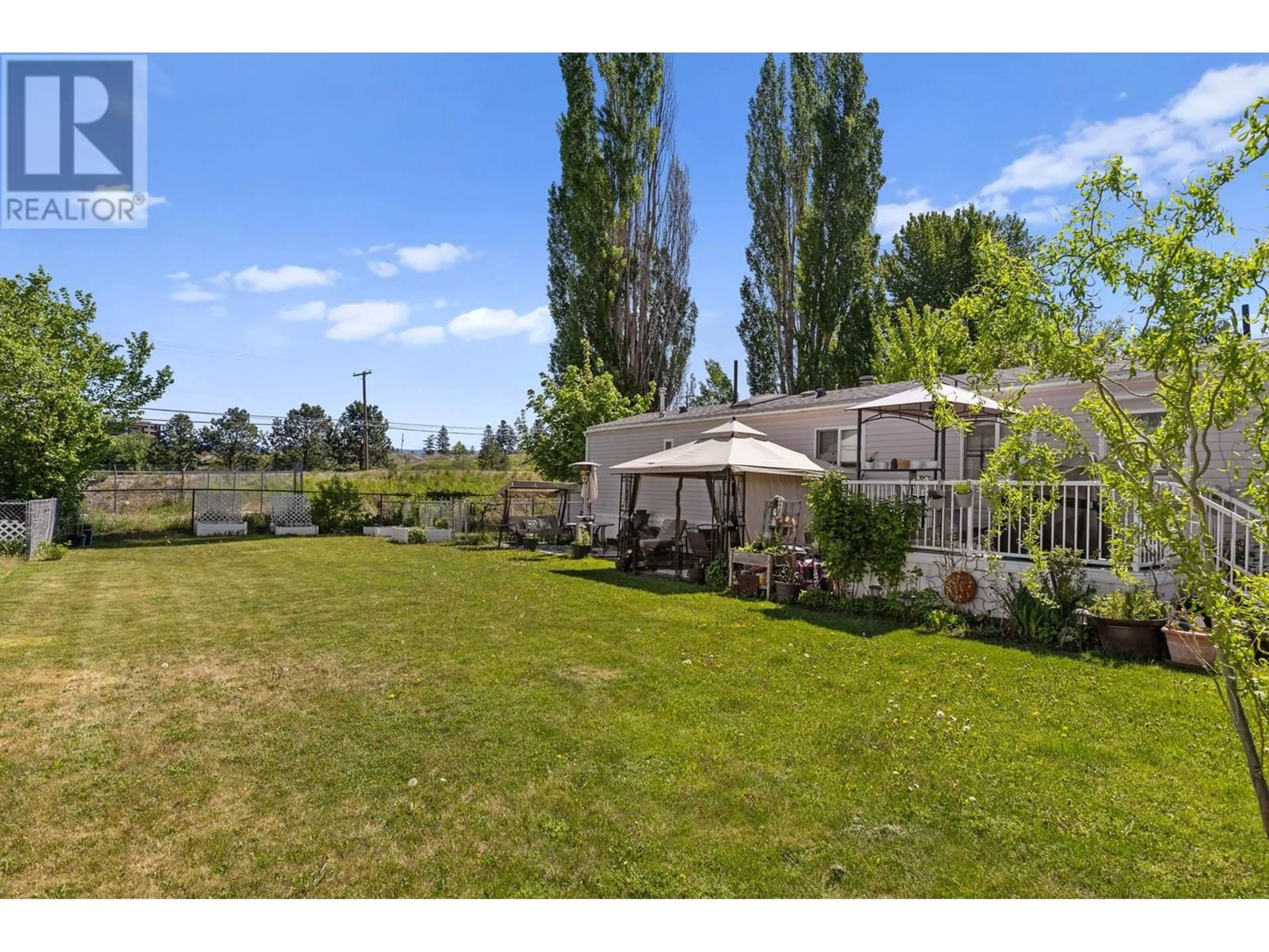A pic from outside/outdoor area/front of a property/back of a property/a pic from drone, unknown for 54 - 1525 WESTSIDE ROAD SOUTH, Kelowna British Columbia V1Z3Y3