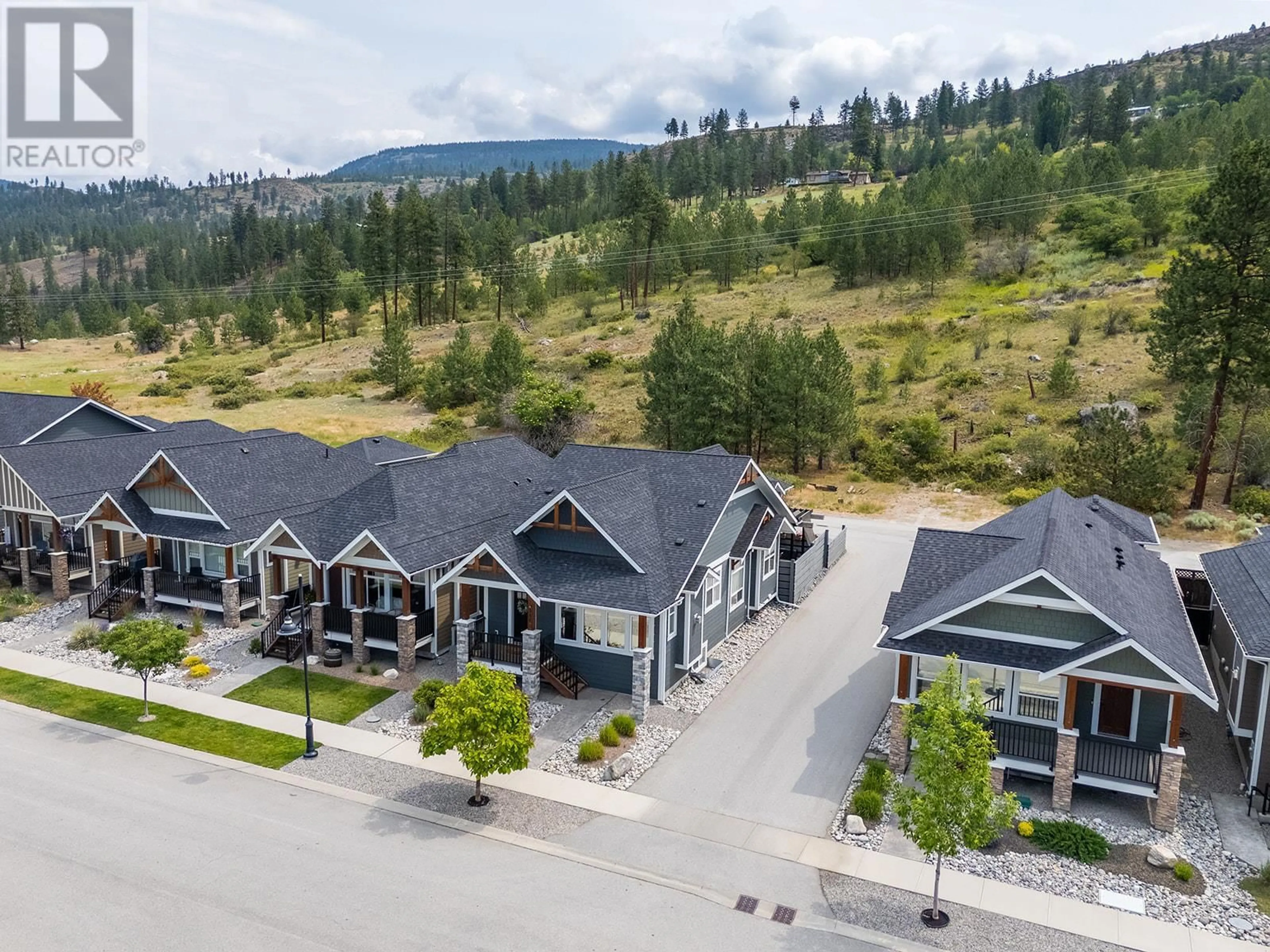 A pic from outside/outdoor area/front of a property/back of a property/a pic from drone, mountain view for 986 HOLDEN ROAD, Penticton British Columbia V2A9G4
