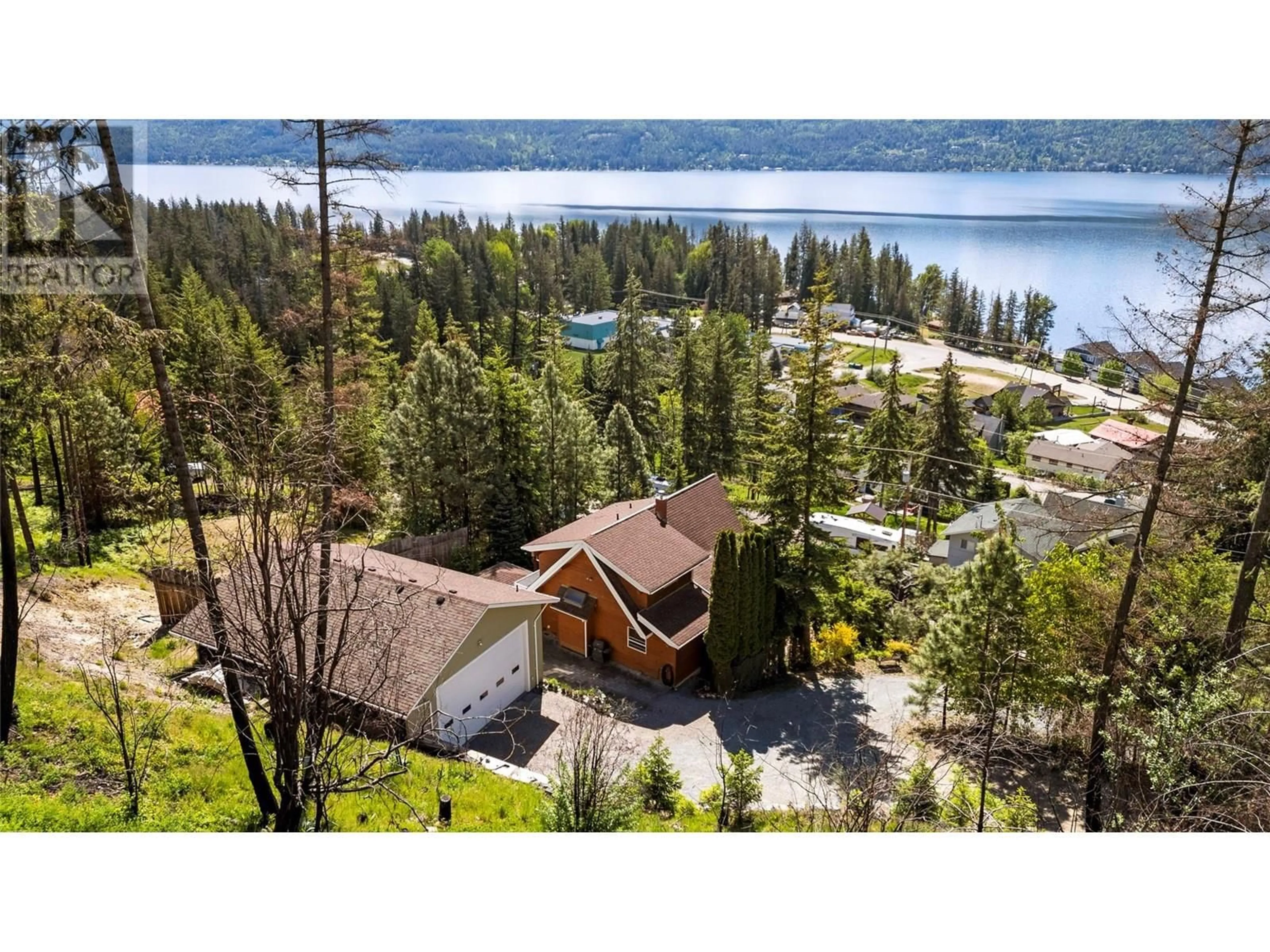 A pic from outside/outdoor area/front of a property/back of a property/a pic from drone, water/lake/river/ocean view for 5261 HLINA ROAD, Celista British Columbia V0E1M6