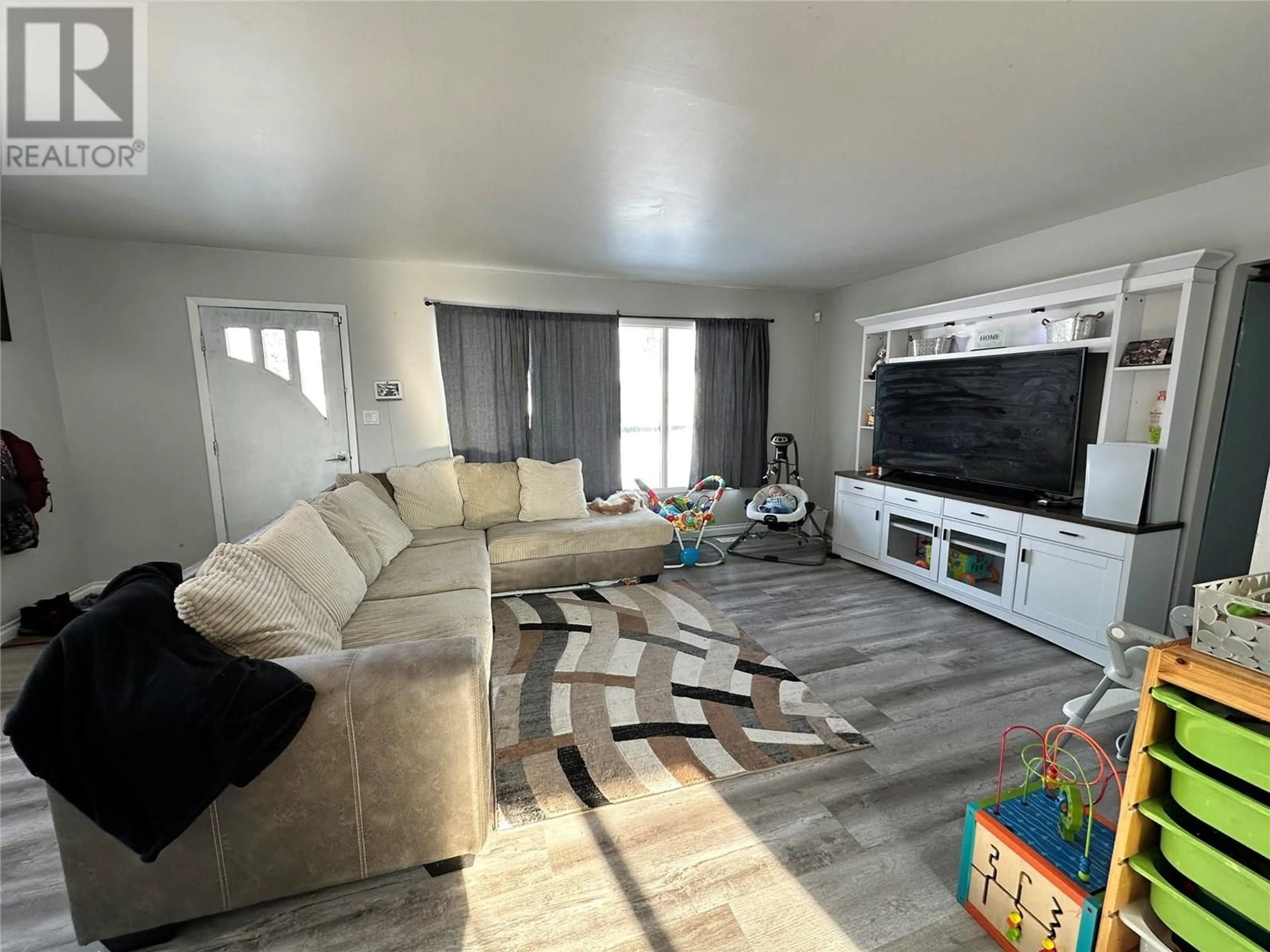 Living room with furniture, unknown for 1913 109 AVENUE, Dawson Creek British Columbia V1G2V8