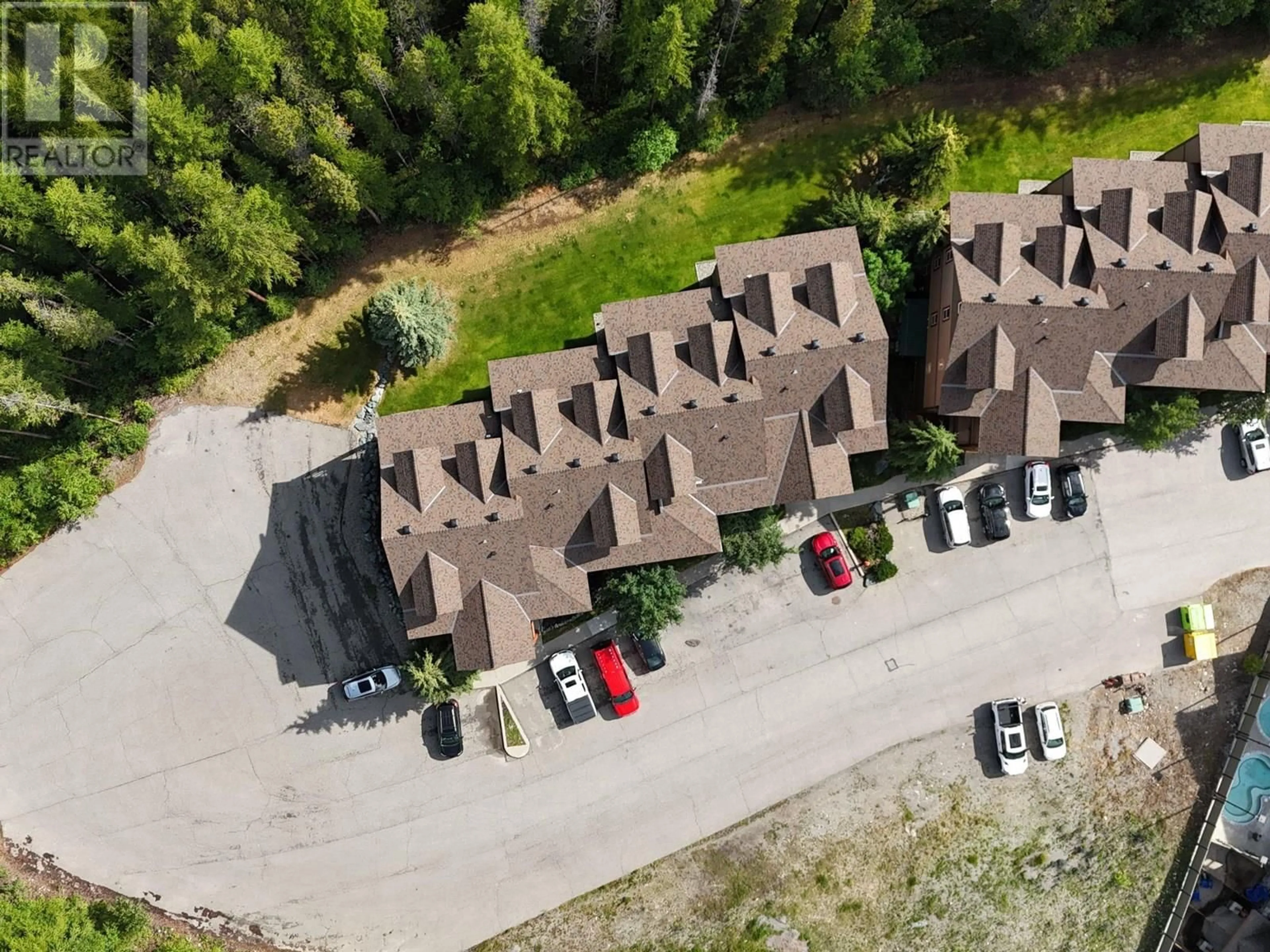 A pic from outside/outdoor area/front of a property/back of a property/a pic from drone, unknown for 403 - 300 STEMWINDER DRIVE, Kimberley British Columbia V1A3E9