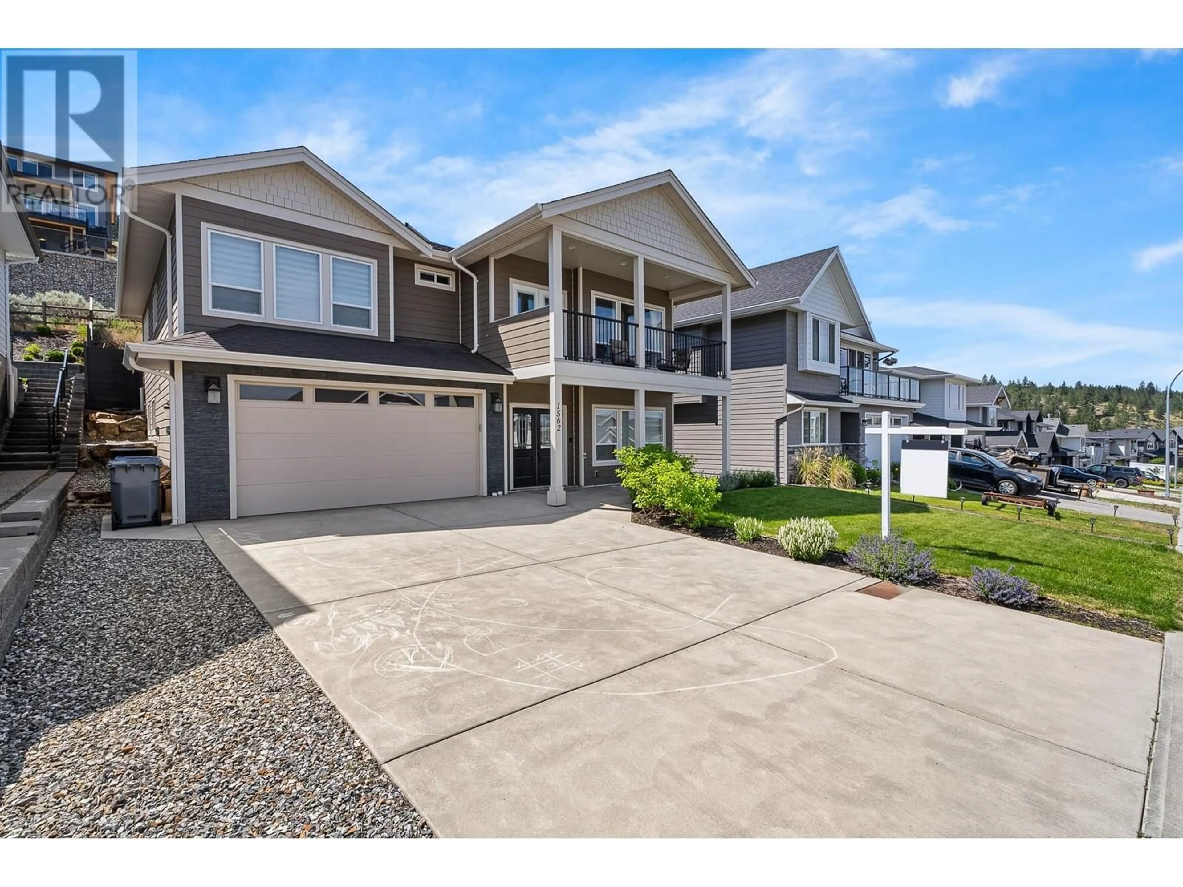 Home with vinyl exterior material, street for 1562 EMERALD DRIVE, Kamloops British Columbia V2E0C4