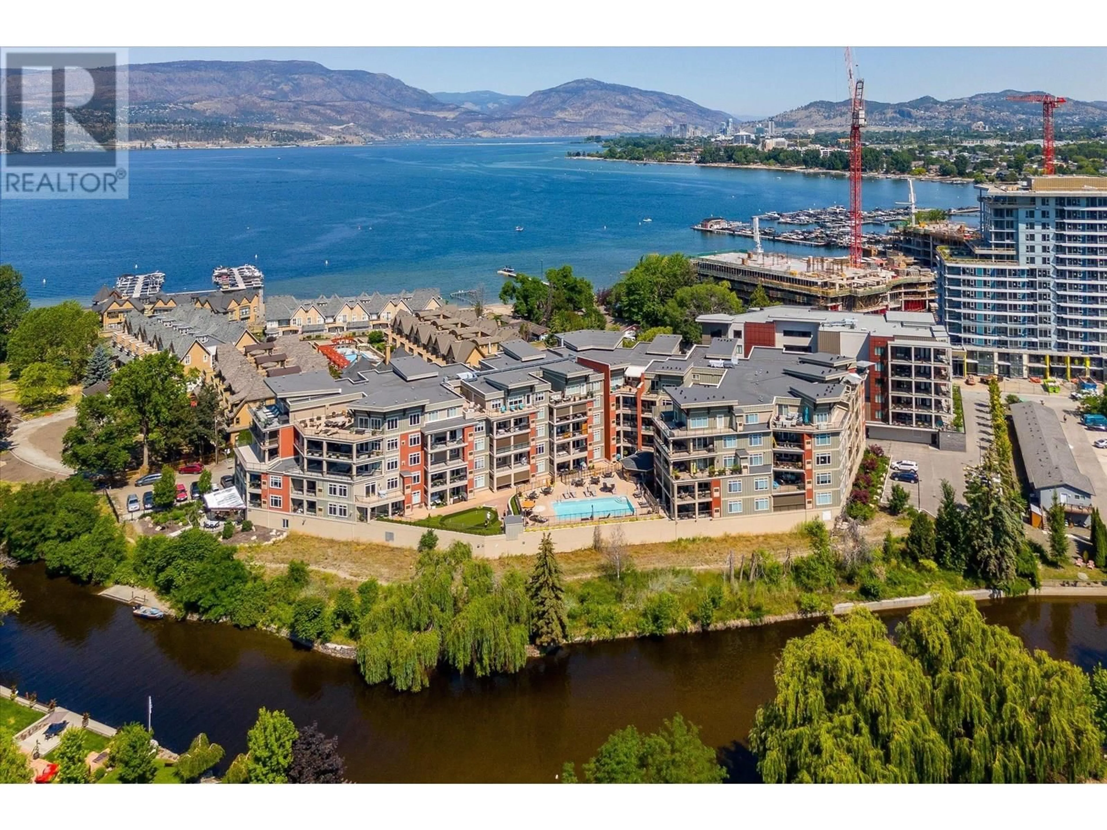 A pic from outside/outdoor area/front of a property/back of a property/a pic from drone, water/lake/river/ocean view for 401 - 3865 TRUSWELL ROAD, Kelowna British Columbia V1W3K9