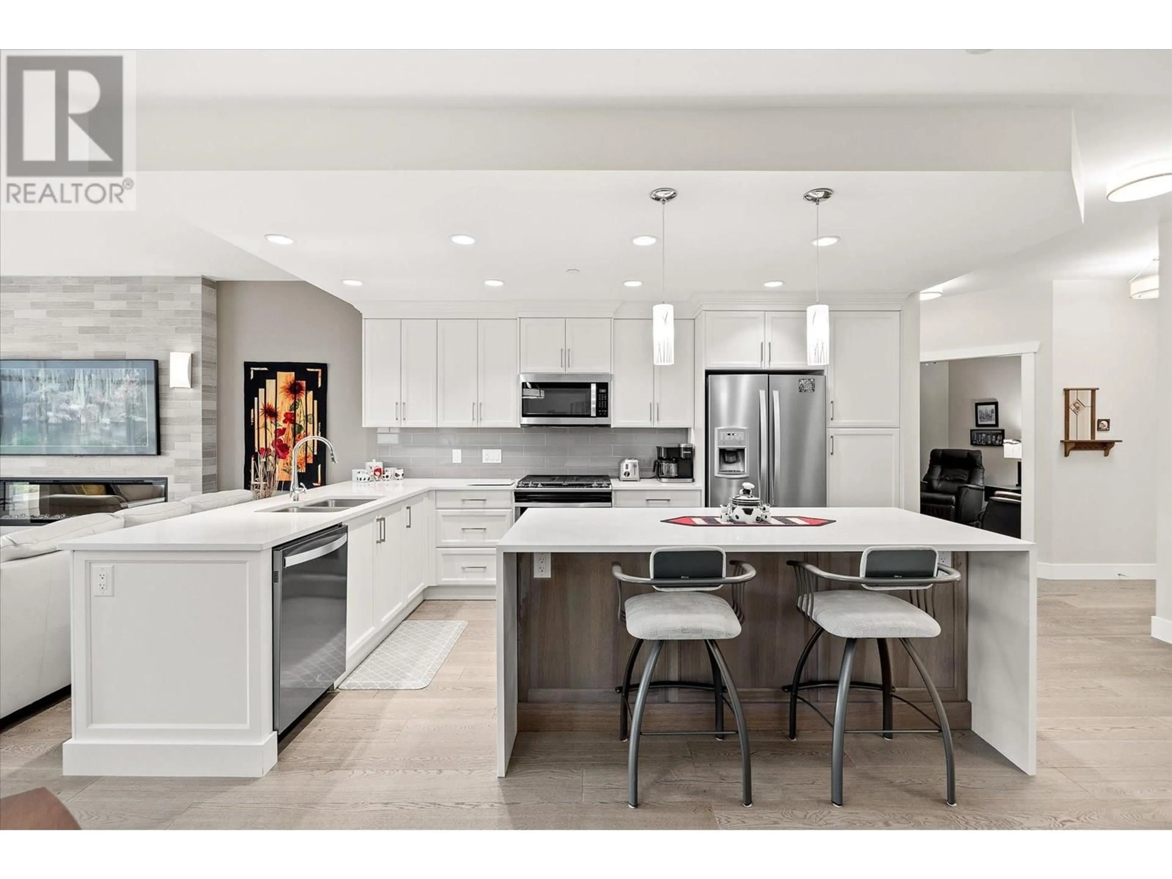 Contemporary kitchen, ceramic/tile floor for 401 - 3865 TRUSWELL ROAD, Kelowna British Columbia V1W3K9