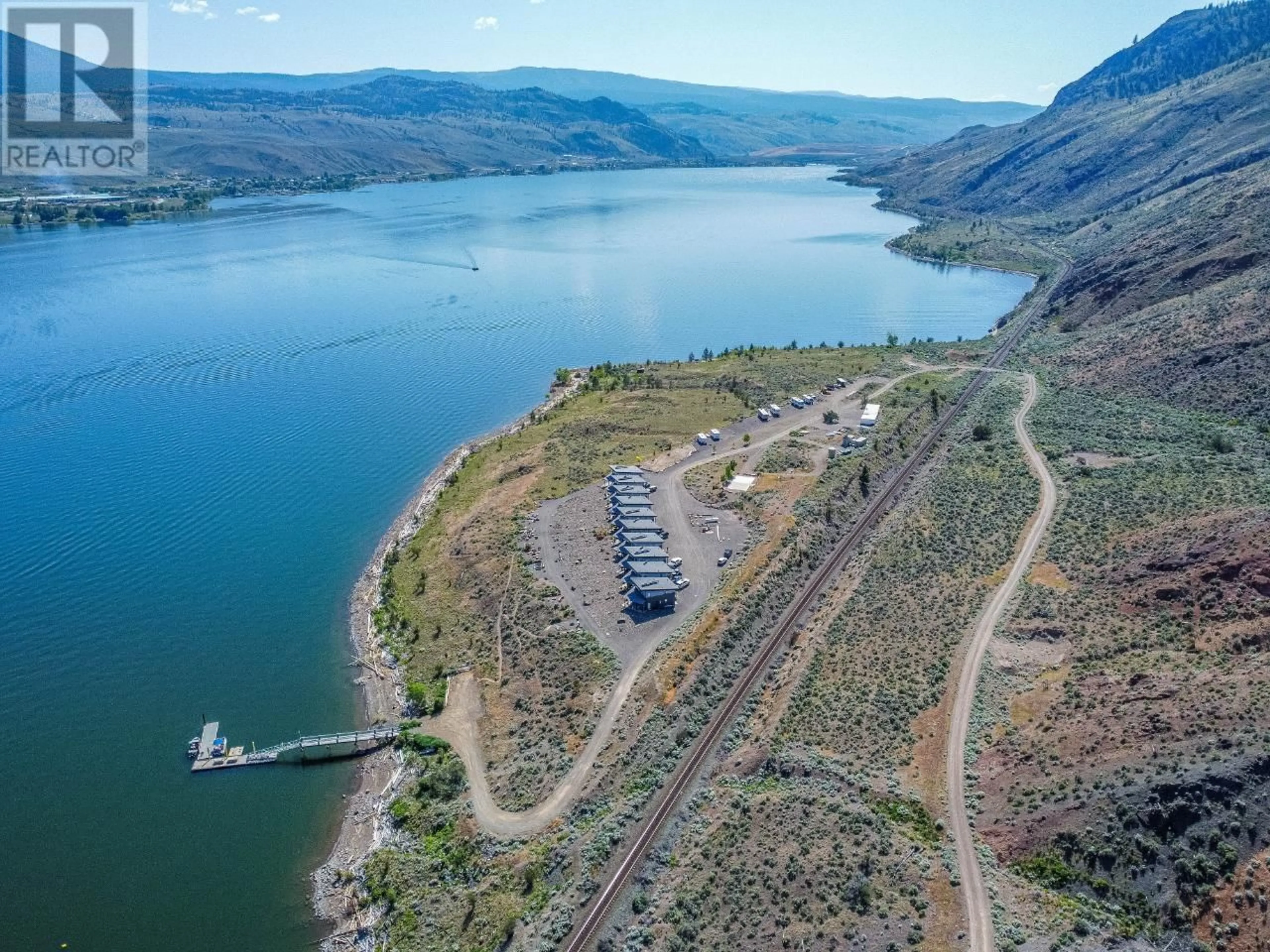 A pic from outside/outdoor area/front of a property/back of a property/a pic from drone, water/lake/river/ocean view for 10 - 3672 SABISTON CREEK ROAD, Kamloops British Columbia V0K2J0