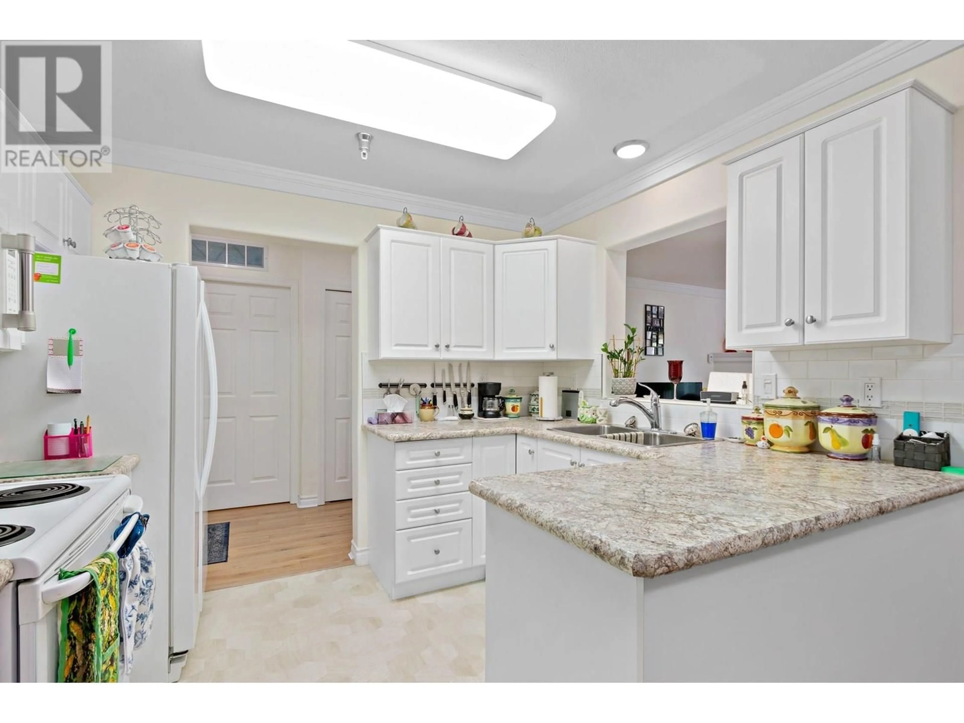 Standard kitchen, ceramic/tile floor for 305 - 2245 ATKINSON STREET, Penticton British Columbia V2A8R7