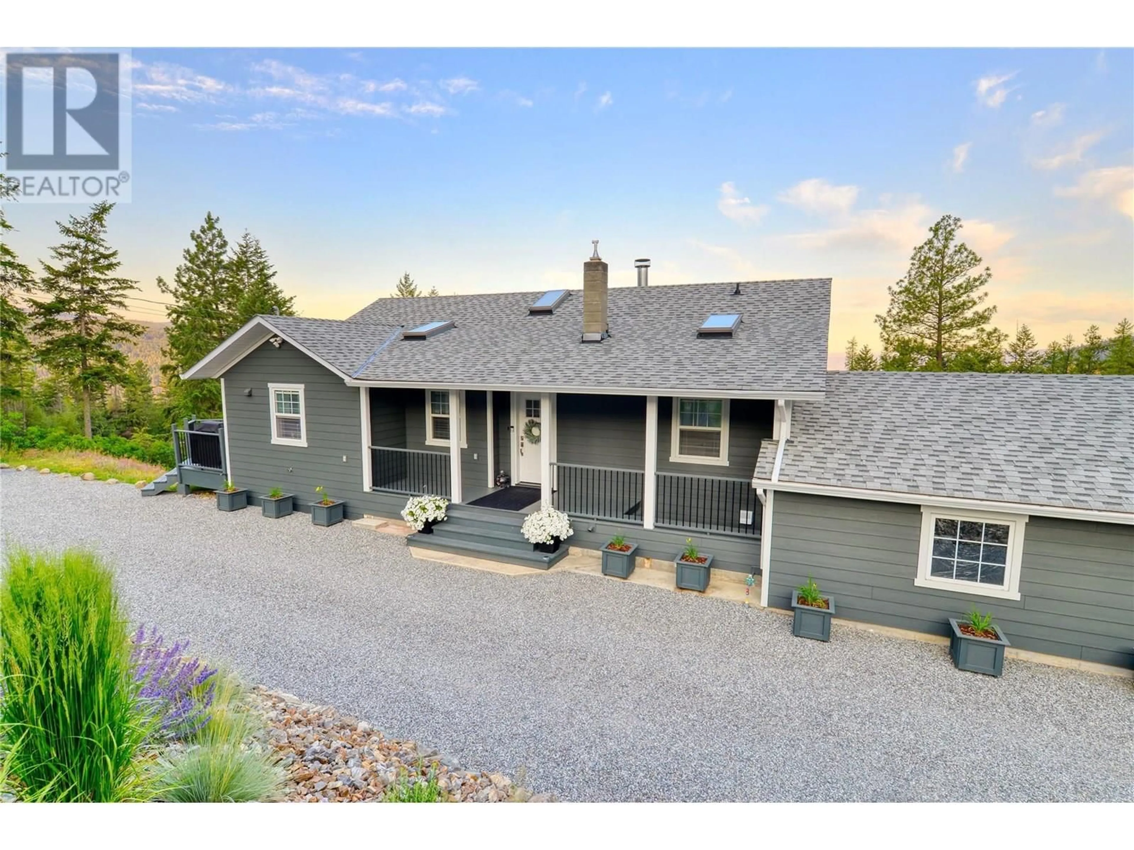 A pic from outside/outdoor area/front of a property/back of a property/a pic from drone, unknown for 2025 HUCKLEBERRY ROAD, Kelowna British Columbia V1P1H5