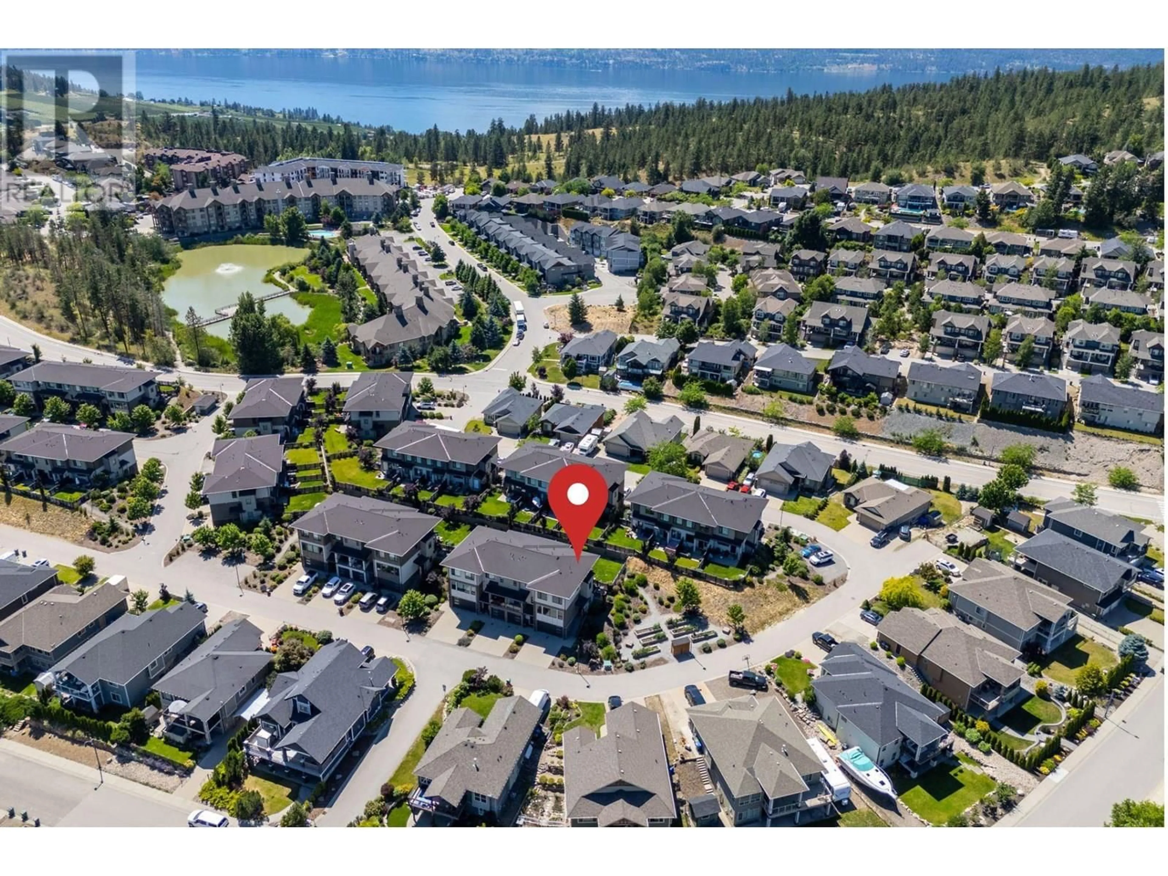 A pic from outside/outdoor area/front of a property/back of a property/a pic from drone, water/lake/river/ocean view for 60 - 12798 LAKE HILL DRIVE, Lake Country British Columbia V4V2W5