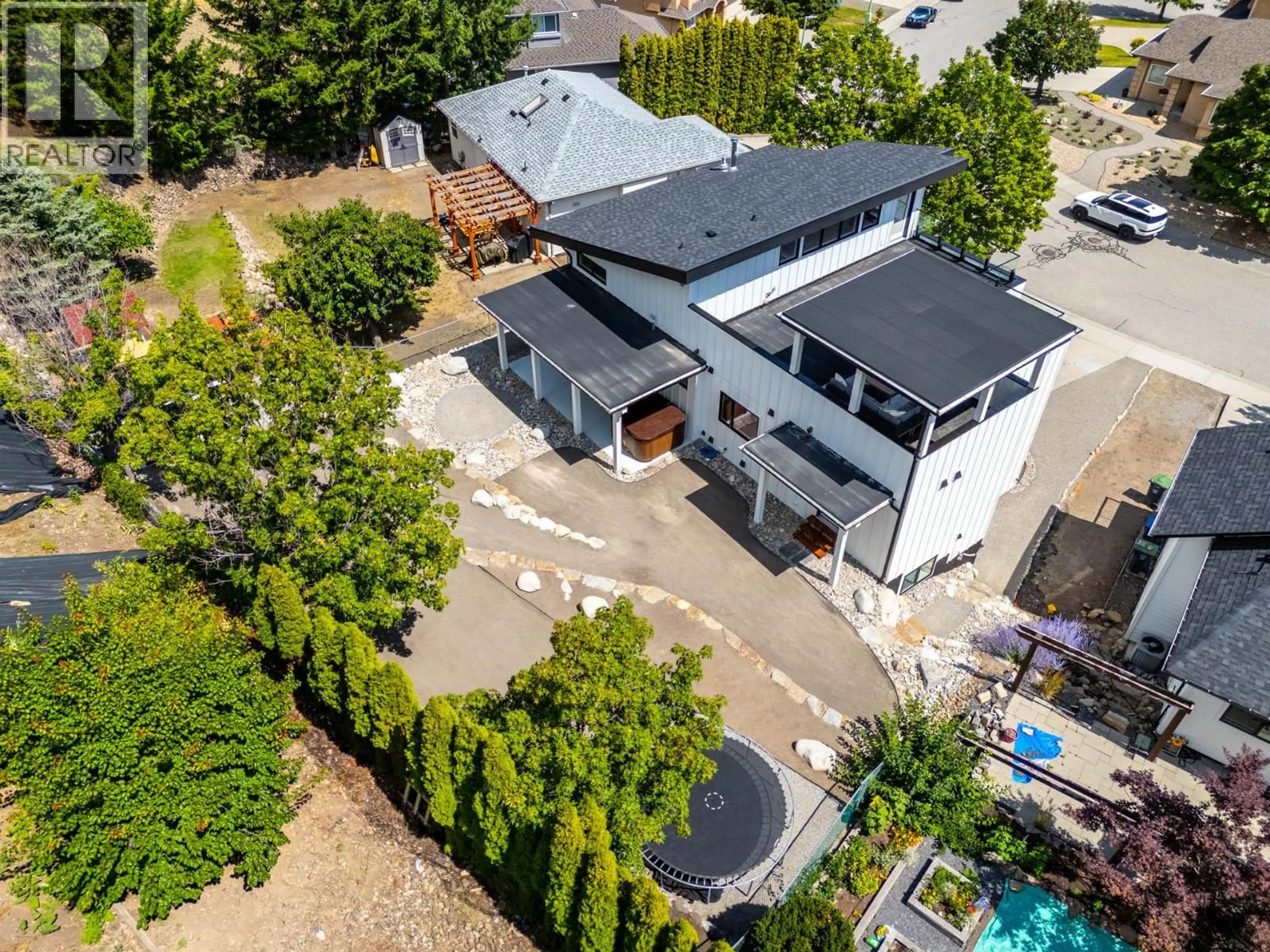 A pic from outside/outdoor area/front of a property/back of a property/a pic from drone, street for 2255 SHANNON WOODS CRESCENT, West Kelowna British Columbia V4T2P2