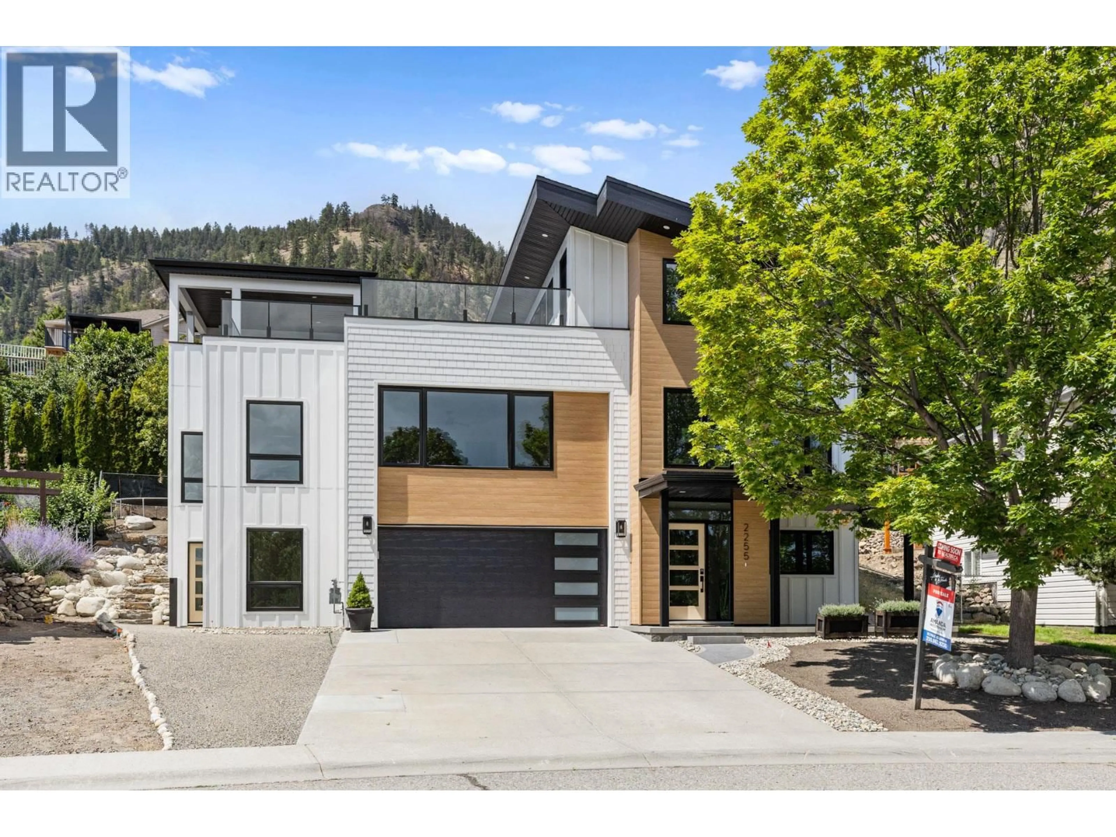 Home with brick exterior material, mountain view for 2255 SHANNON WOODS CRESCENT, West Kelowna British Columbia V4T2P2