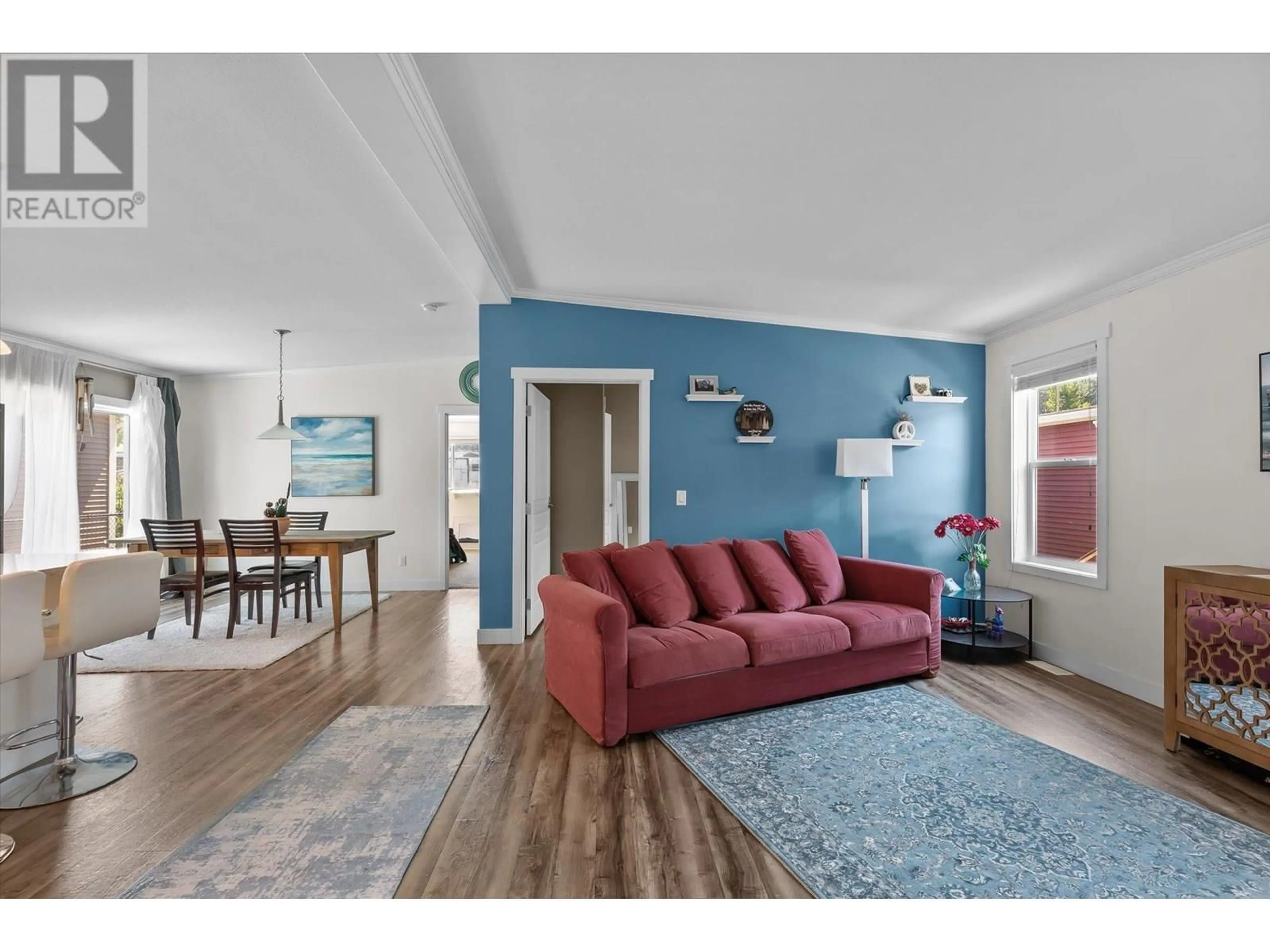 Living room with furniture, wood/laminate floor for 75 - 1835 NANCEE WAY COURT, West Kelowna British Columbia V1Z4C1