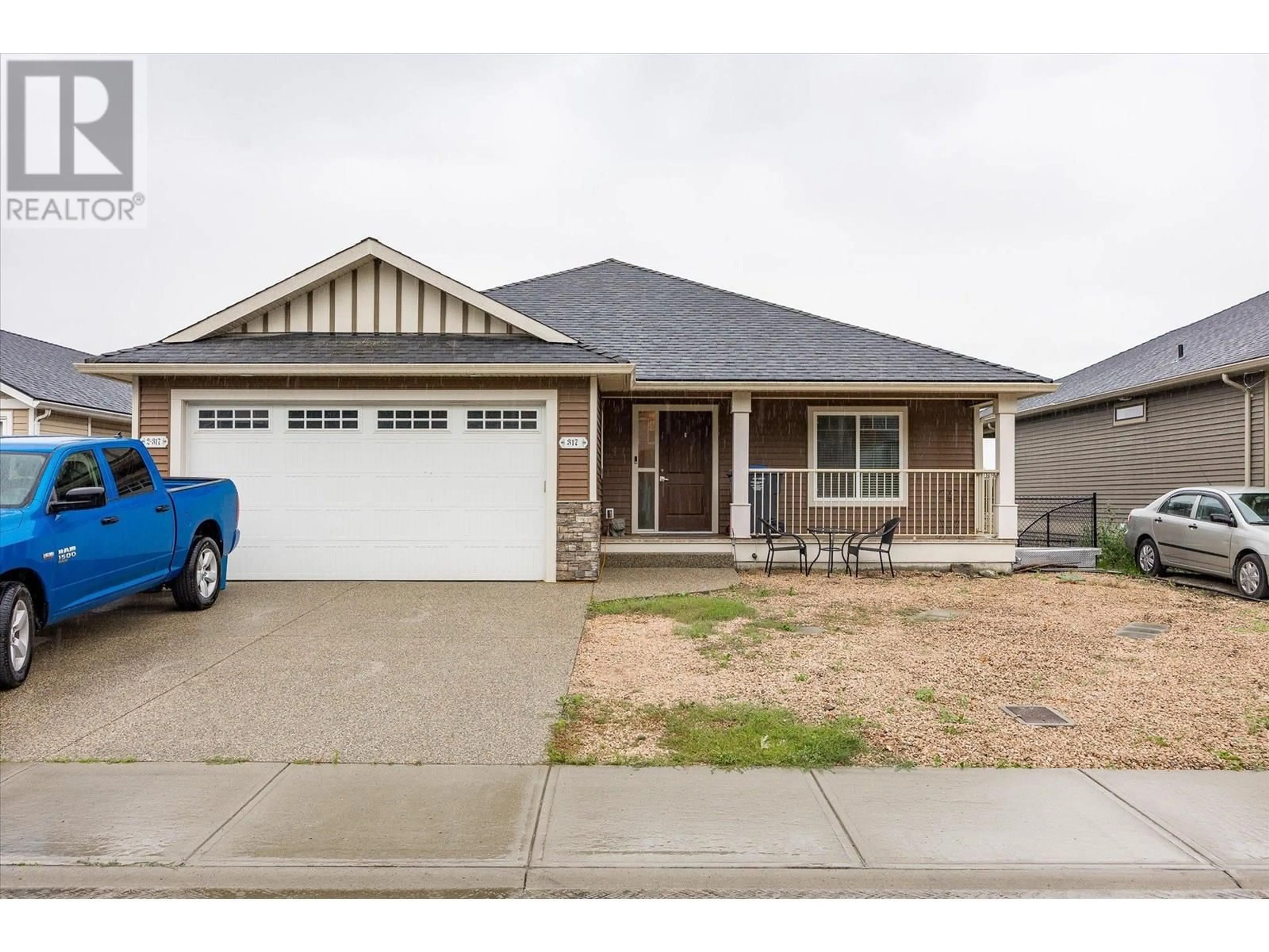 Home with brick exterior material, street for 317 ARAB ROAD, Kelowna British Columbia V1V3A8