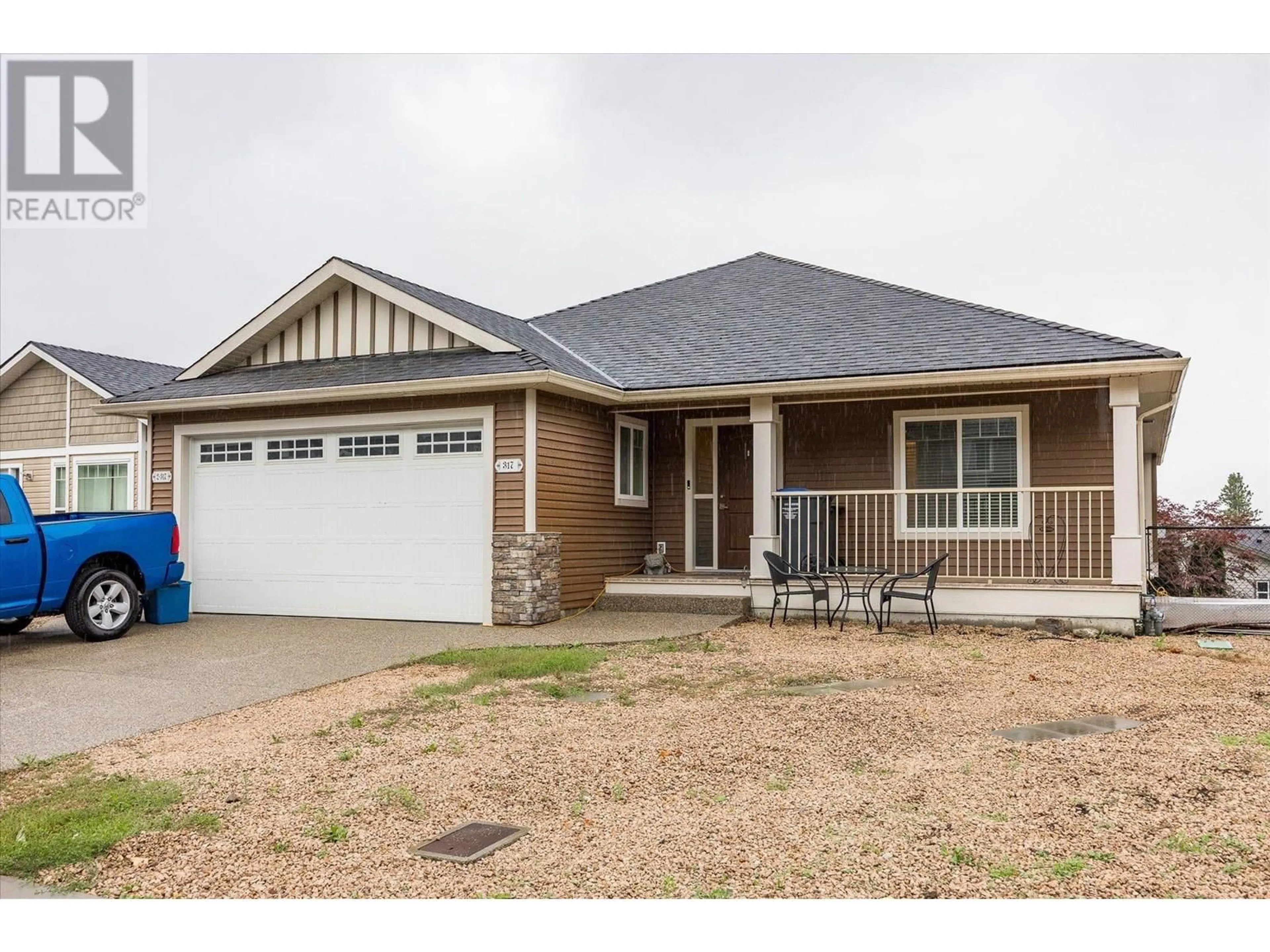 Home with brick exterior material, street for 317 ARAB ROAD, Kelowna British Columbia V1V3A8