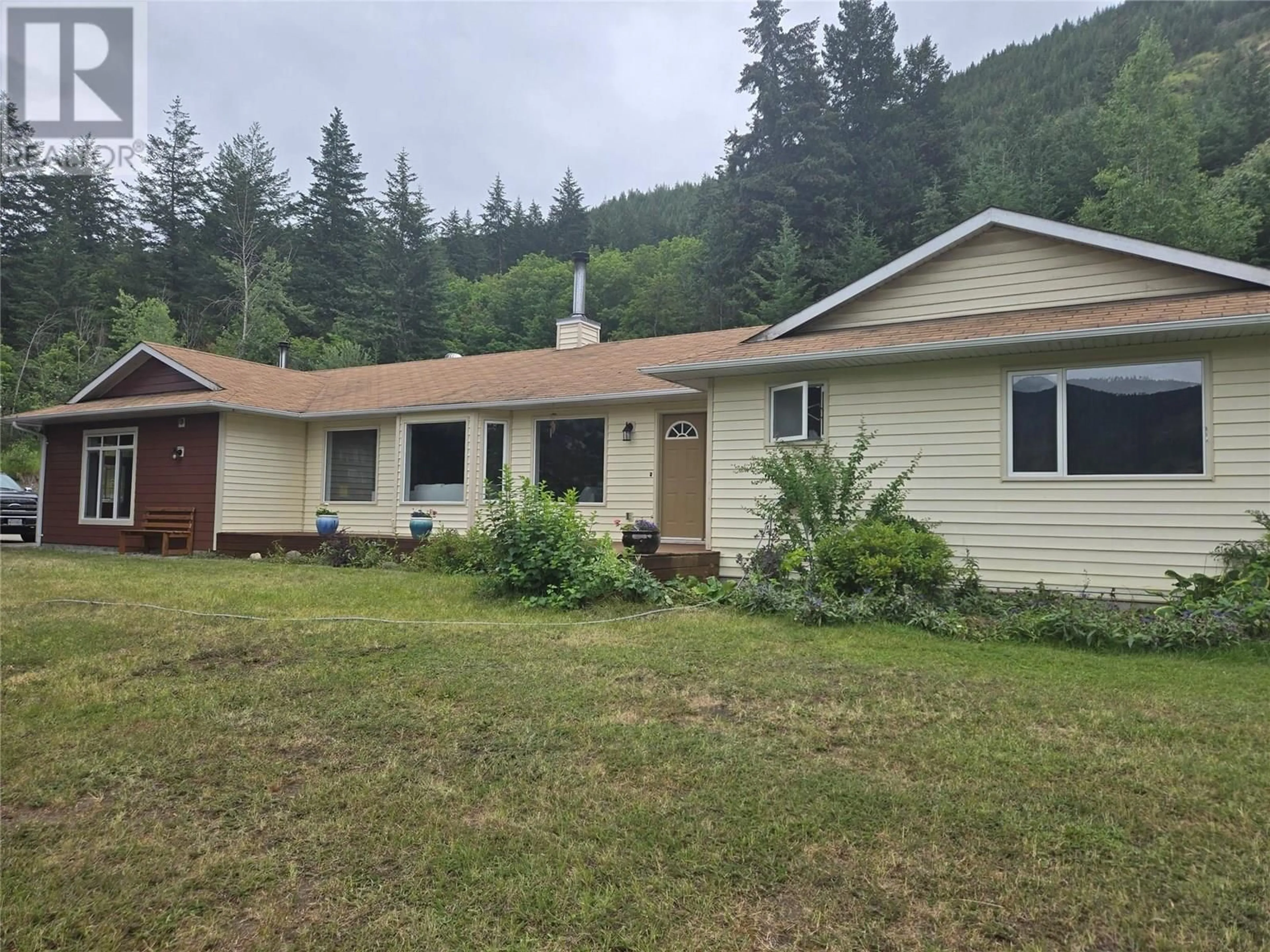 Home with vinyl exterior material, mountain view for 6960 BREWER ROAD, Coldstream British Columbia V1B3H2