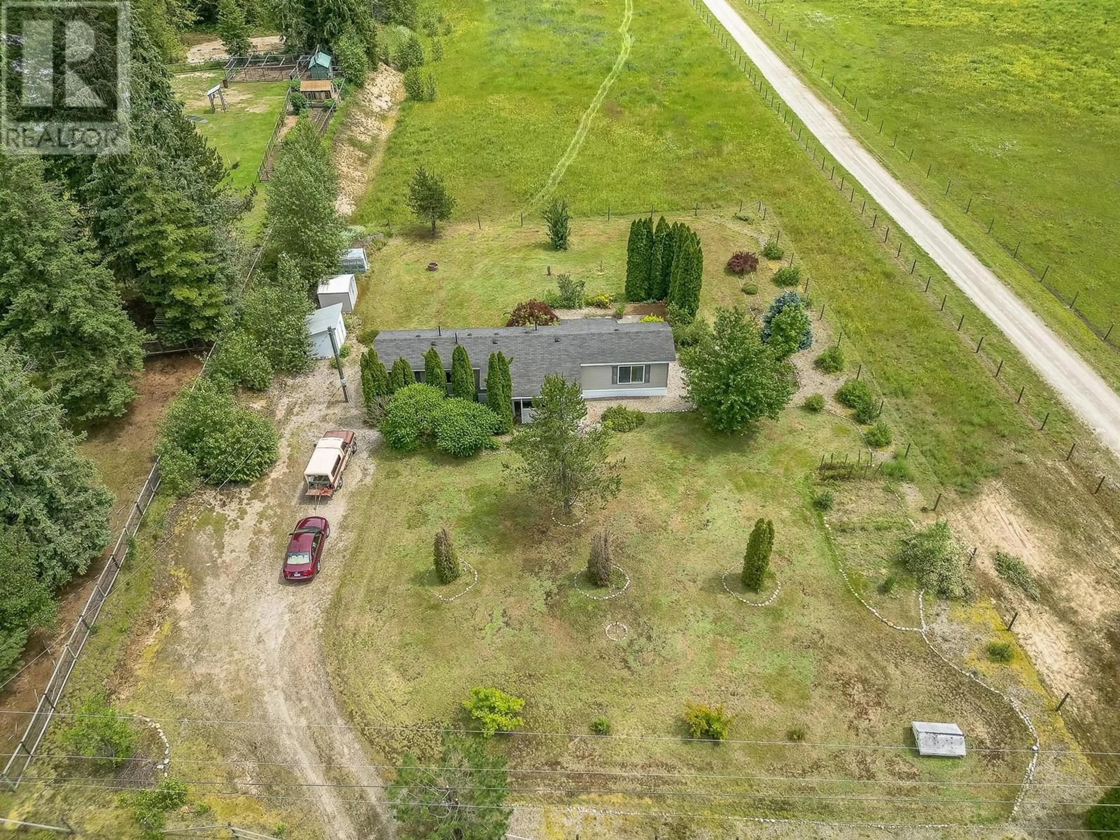 A pic from outside/outdoor area/front of a property/back of a property/a pic from drone, unknown for 3630 YARD CREEK LOOP ROAD, Malakwa British Columbia V0E2J0