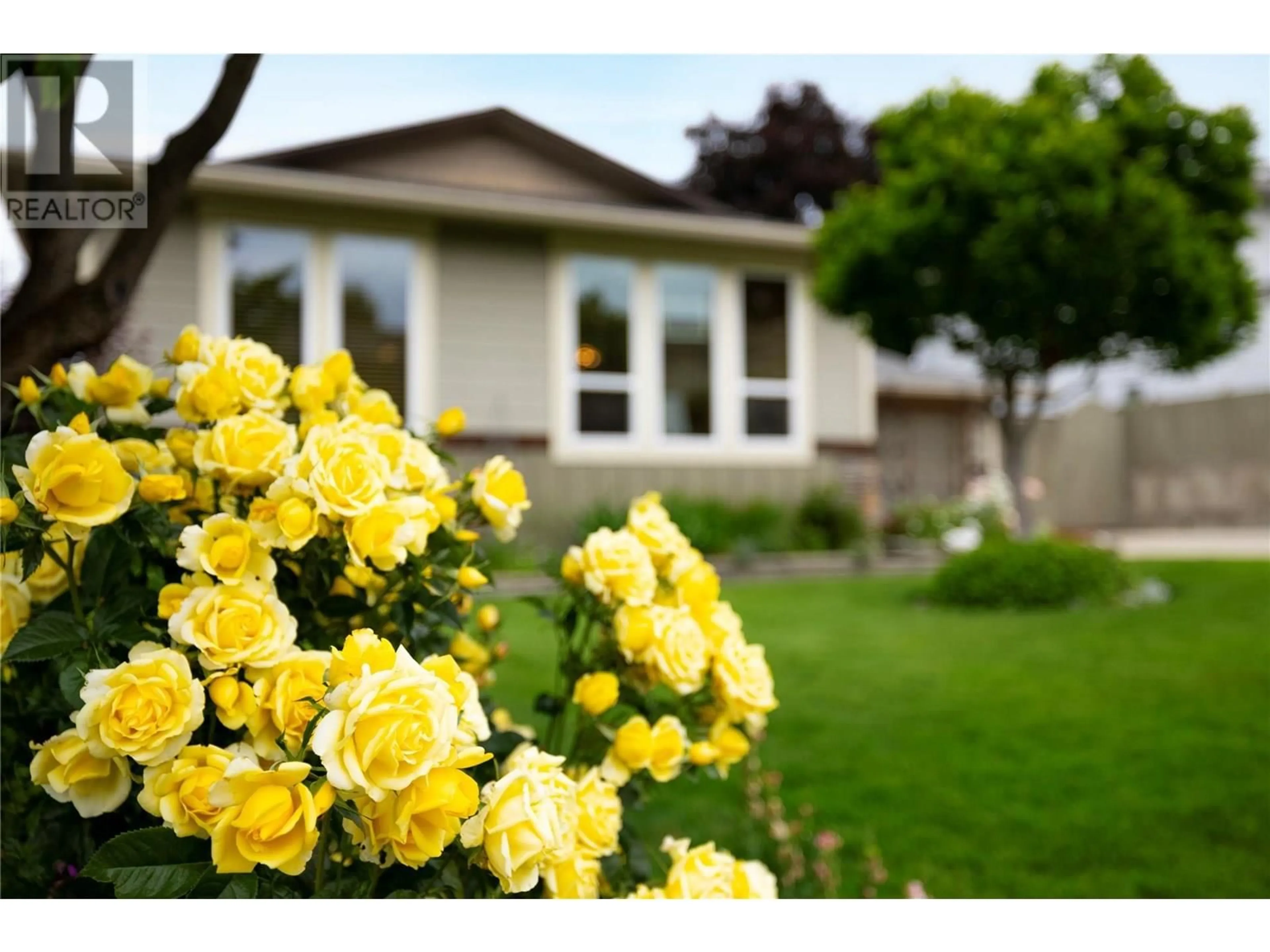 Home with vinyl exterior material, street for 1203 41 AVENUE, Vernon British Columbia V1T8A6