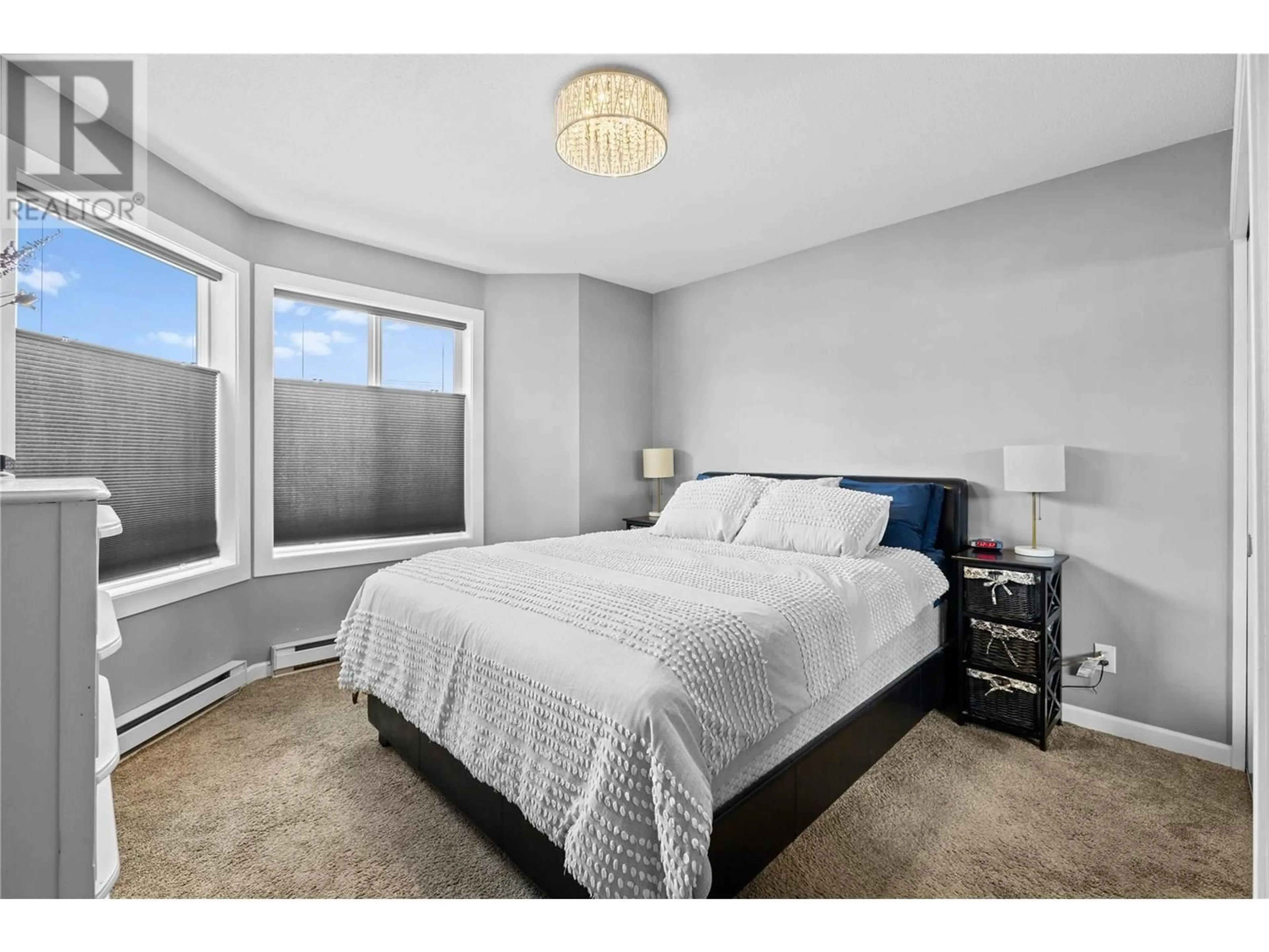 Bedroom with bed, unknown for 209 - 769 KLO ROAD, Kelowna British Columbia V1Y9L9