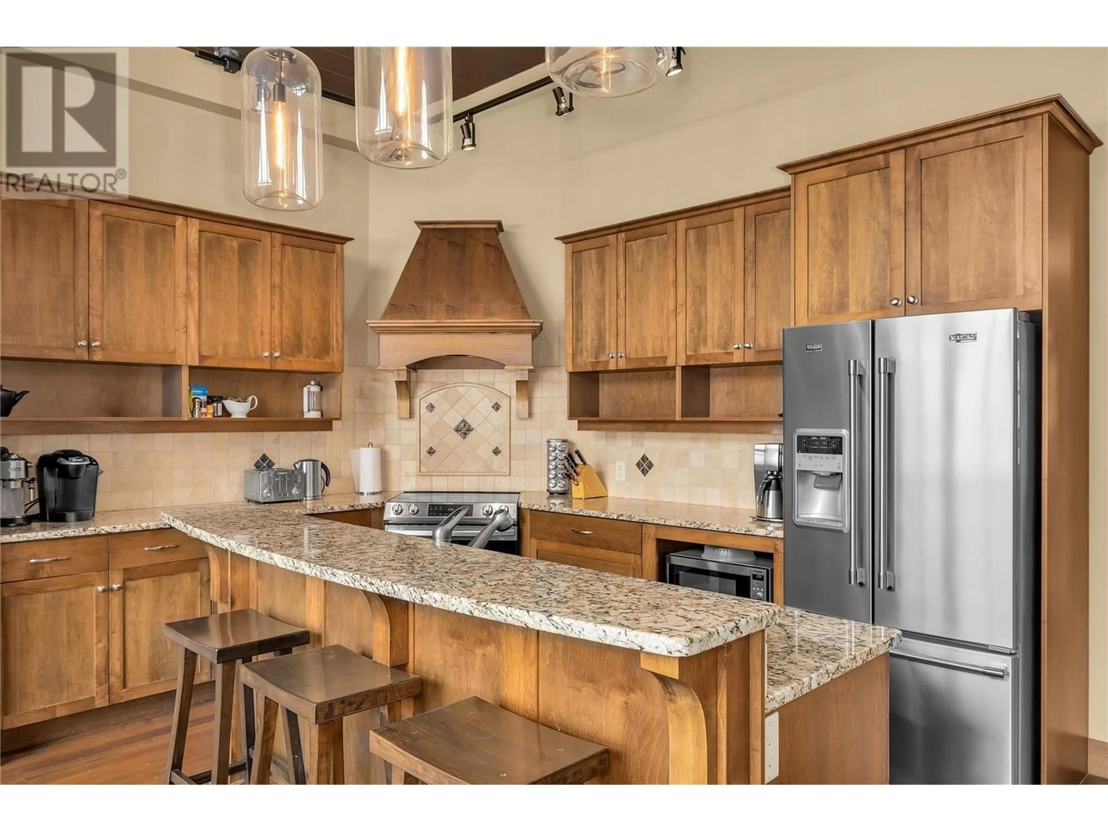 Open concept kitchen, ceramic/tile floor for 26 - 5095 SNOWBIRD WAY, Big White British Columbia V1P1P3