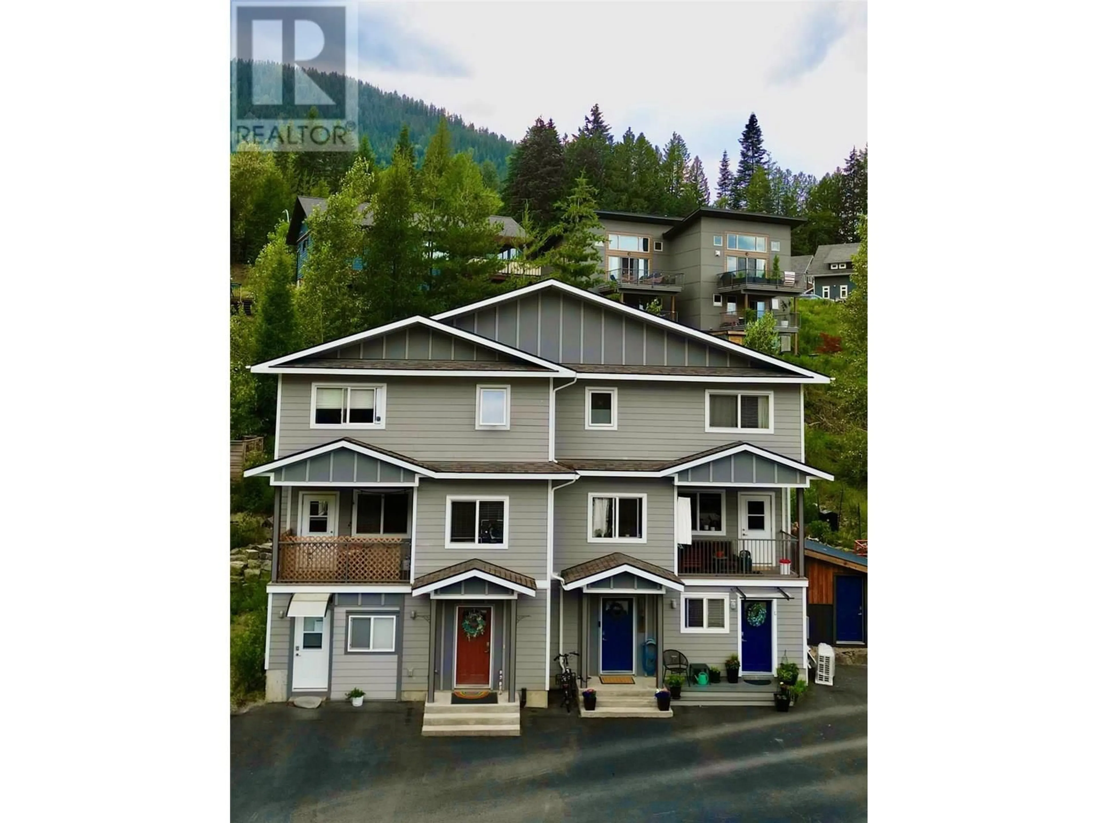A pic from outside/outdoor area/front of a property/back of a property/a pic from drone, street for A - 2410 PERRIER LANE, Nelson British Columbia V1L7C3
