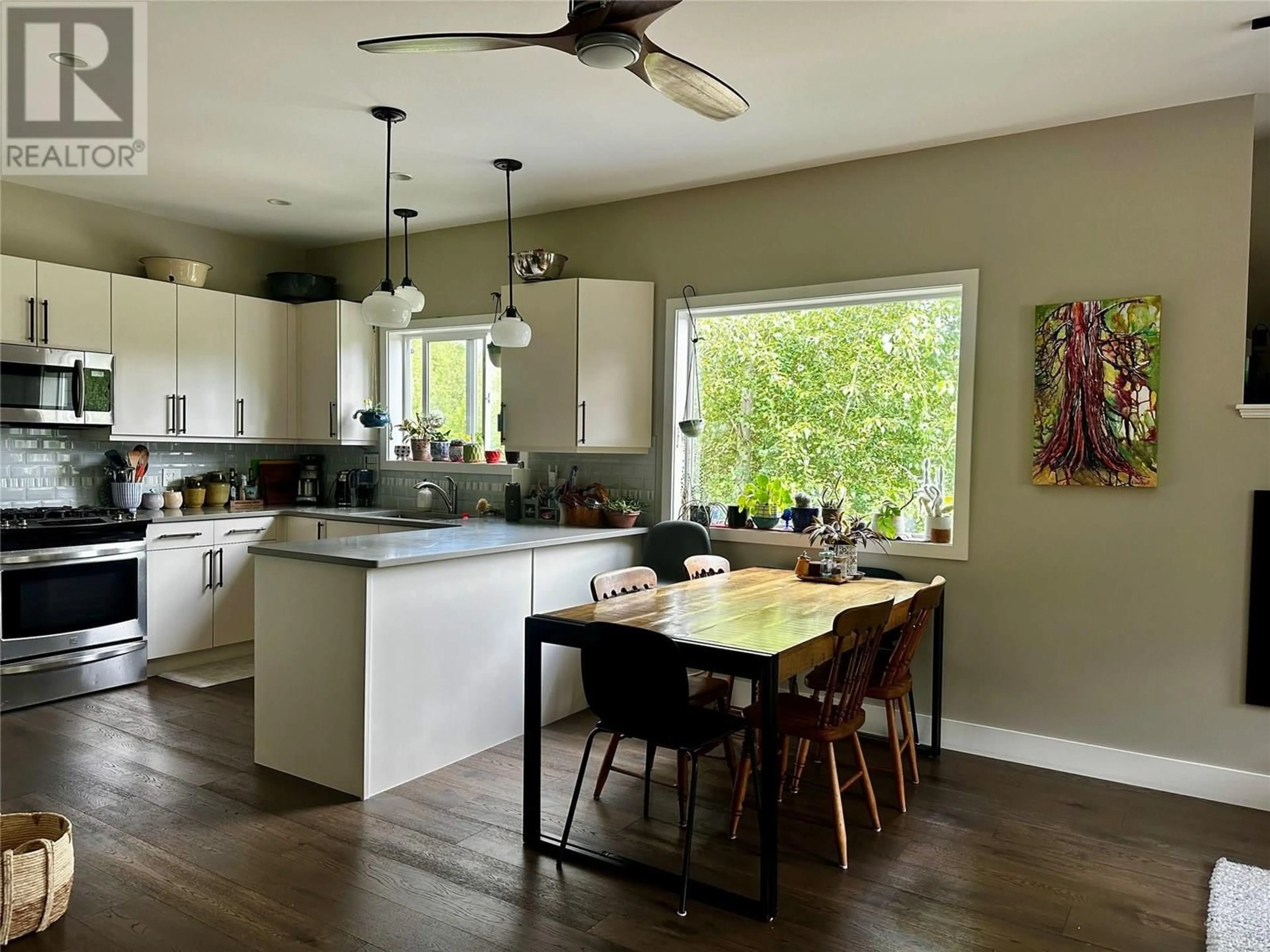 Open concept kitchen, wood/laminate floor for A - 2410 PERRIER LANE, Nelson British Columbia V1L7C3