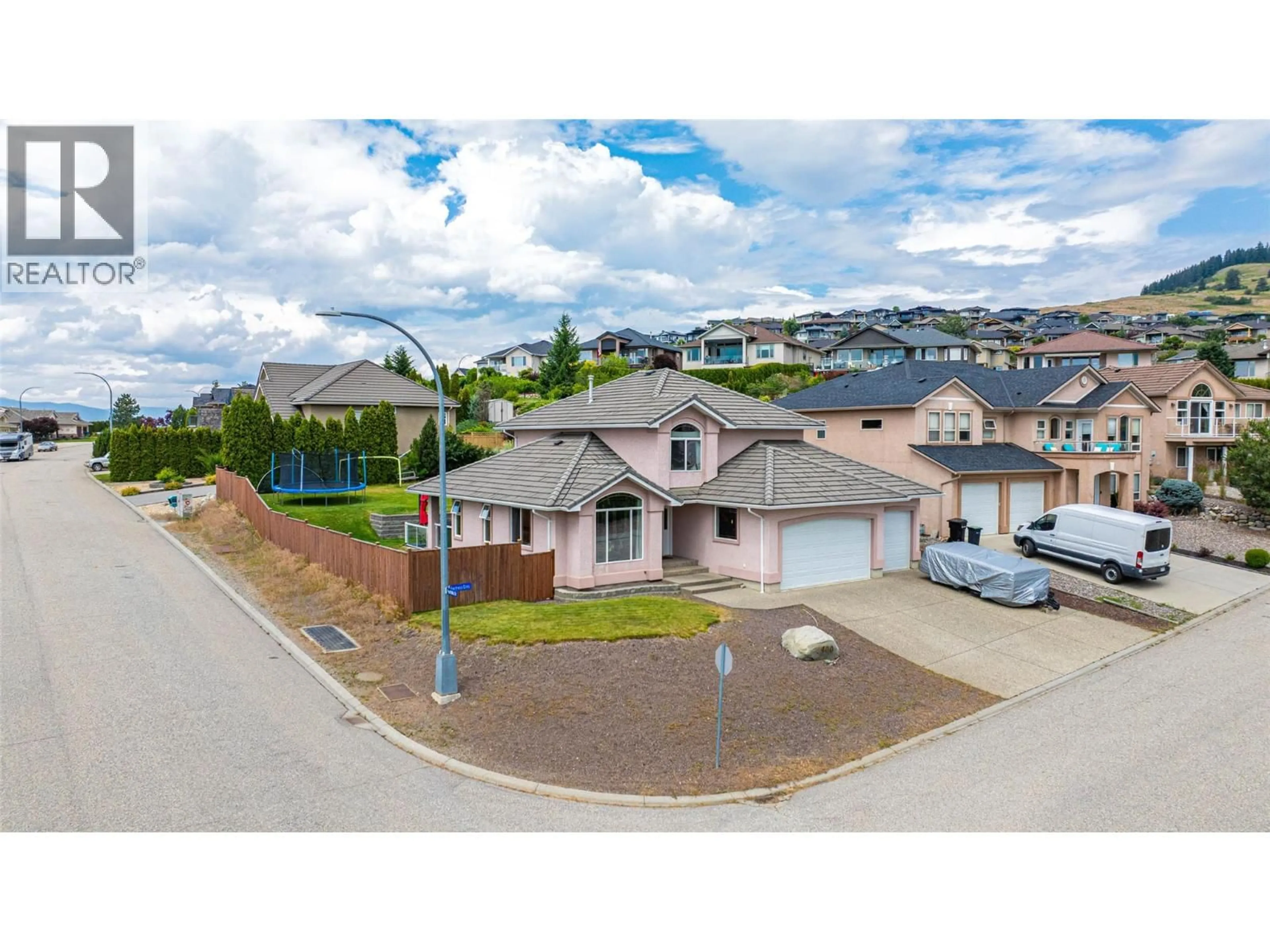 A pic from outside/outdoor area/front of a property/back of a property/a pic from drone, street for 400 FORTRESS CRESCENT, Vernon British Columbia V1B3W3