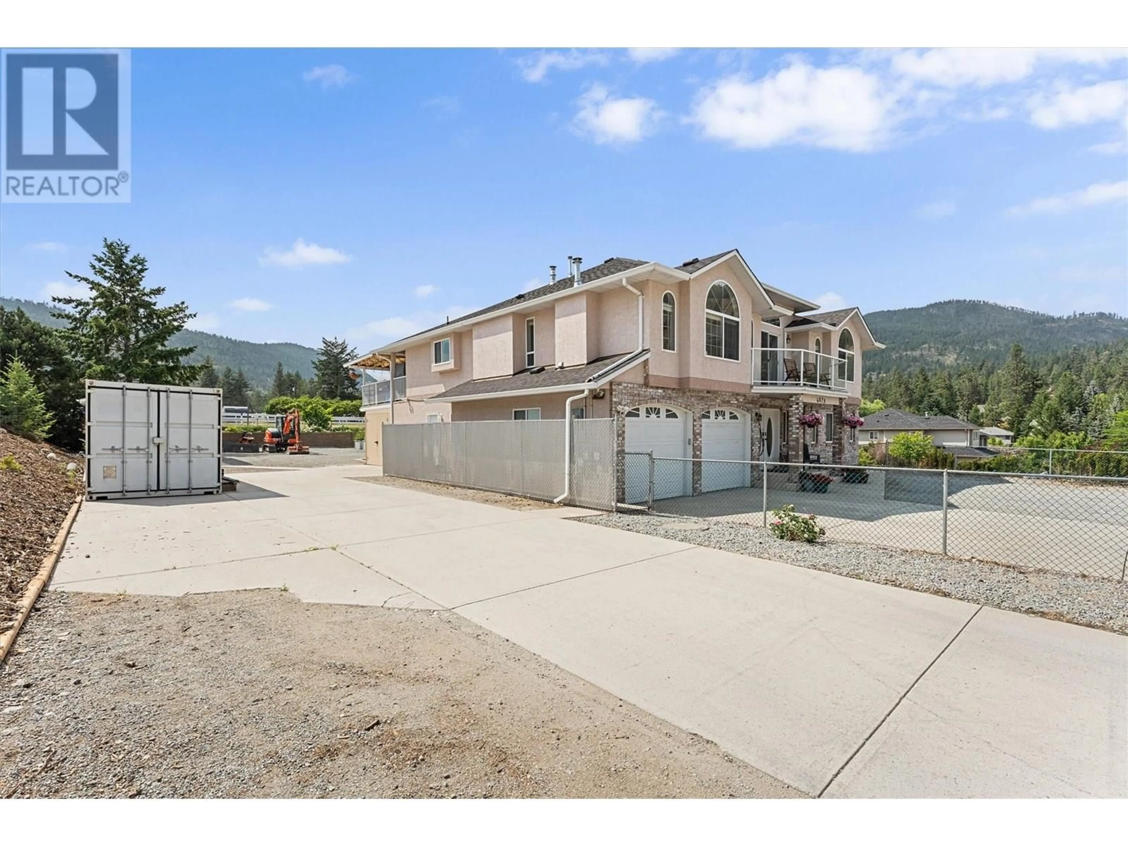 A pic from outside/outdoor area/front of a property/back of a property/a pic from drone, mountain view for 4029 SMITH WAY, Peachland British Columbia V0H1X2