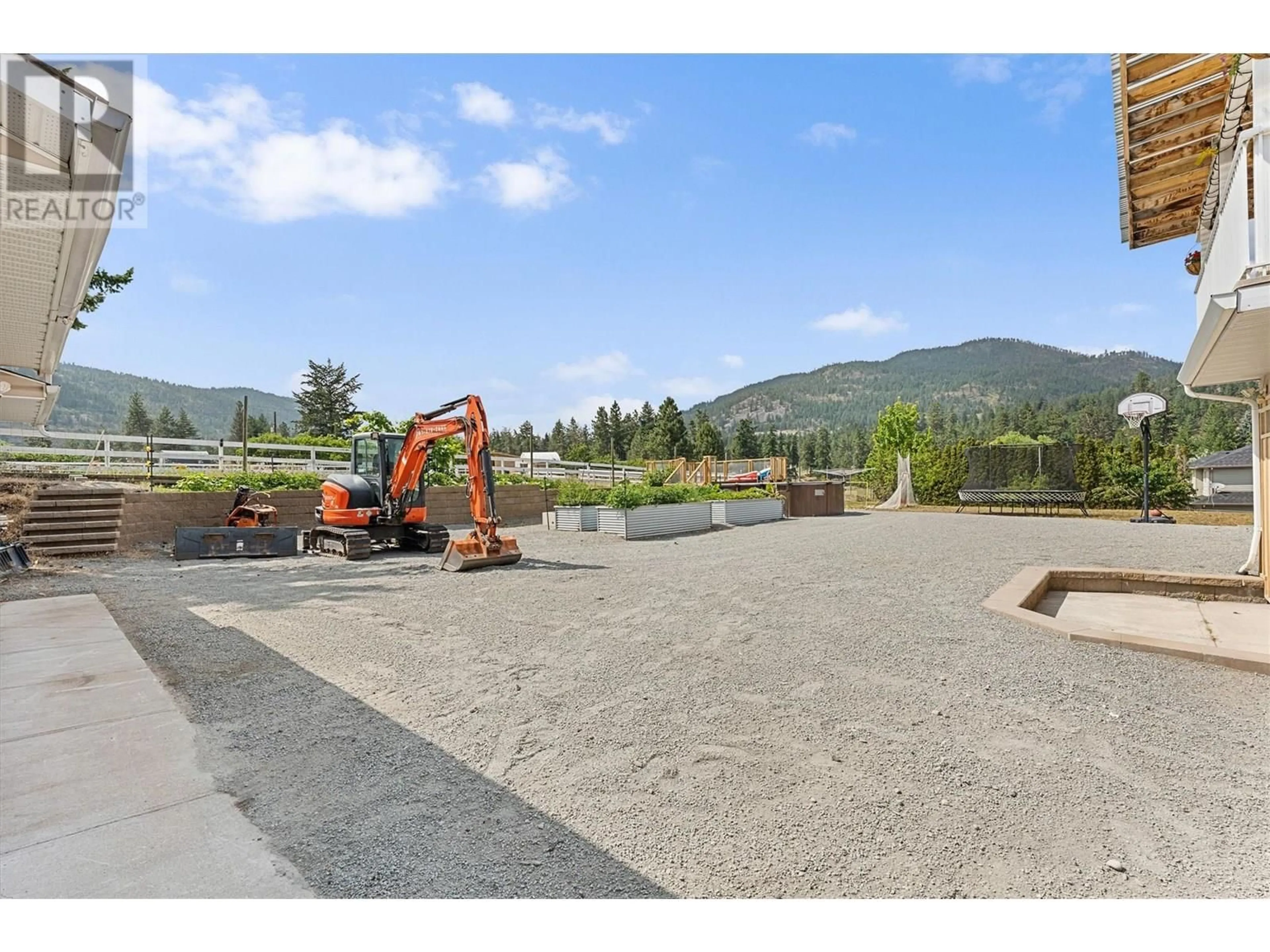 A pic from outside/outdoor area/front of a property/back of a property/a pic from drone, mountain view for 4029 SMITH WAY, Peachland British Columbia V0H1X2