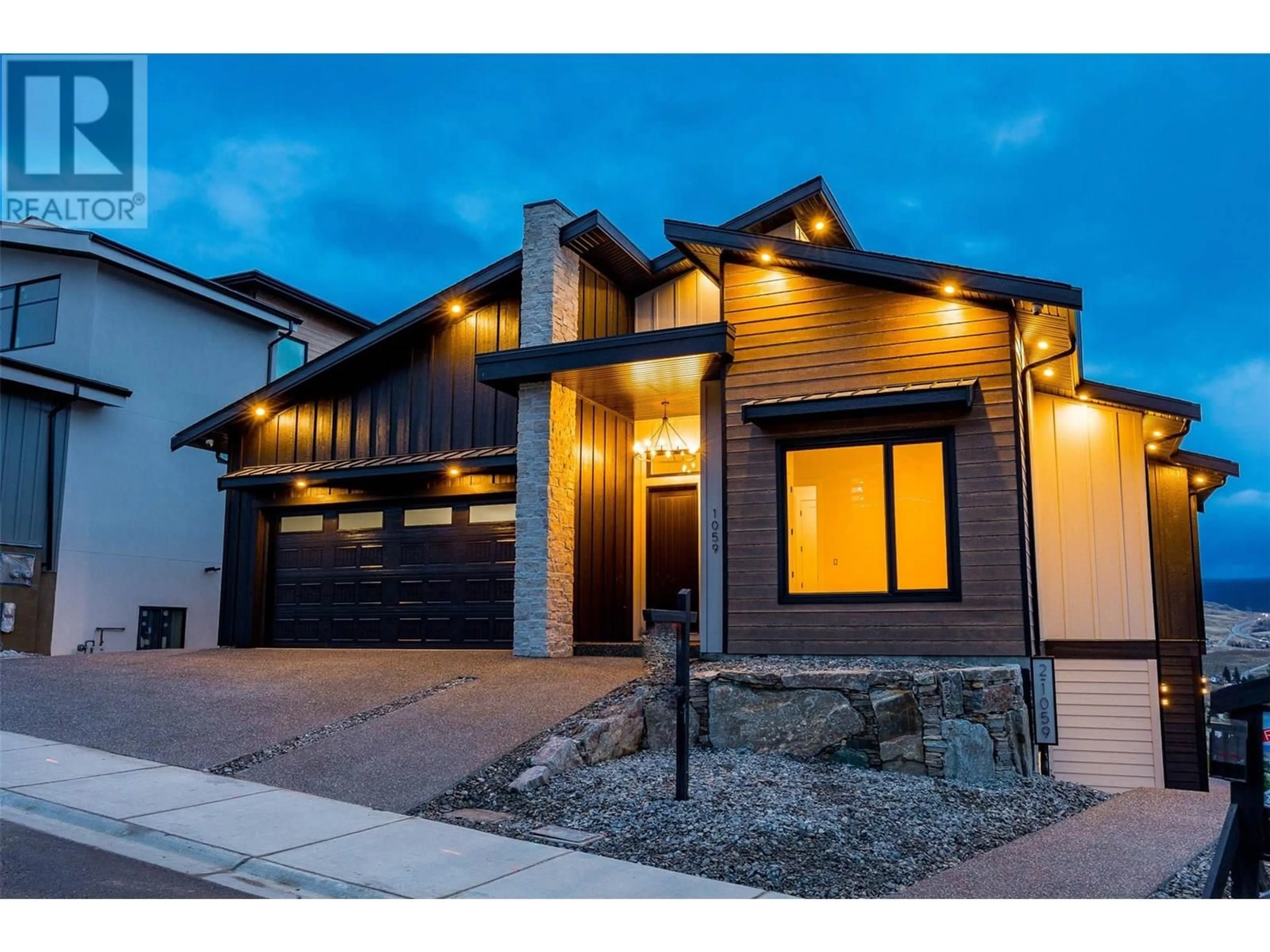 Home with brick exterior material, street for 1059 CARNOUSTIE DRIVE, Kelowna British Columbia V1P0A3