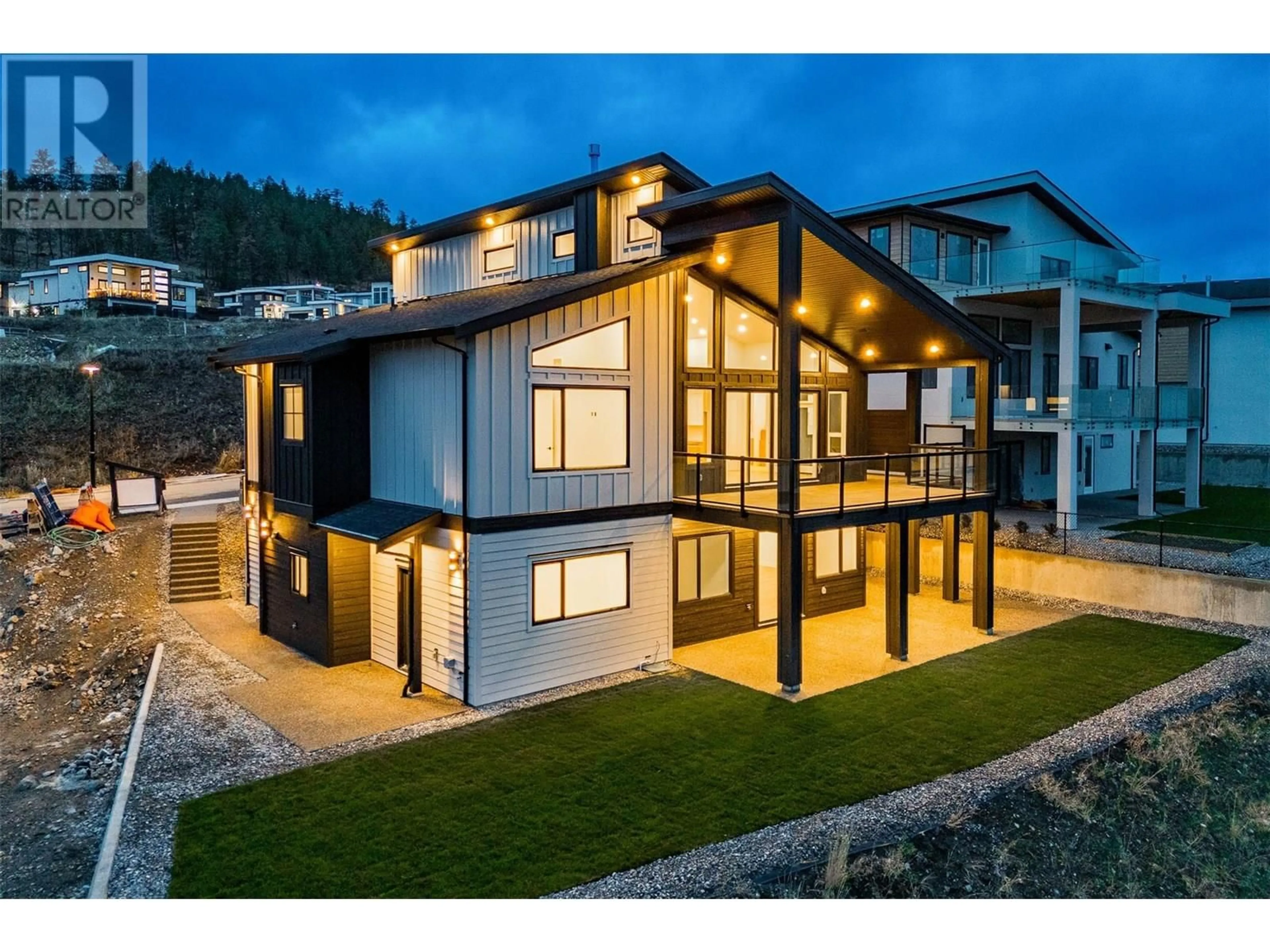 Home with vinyl exterior material, mountain view for 1059 CARNOUSTIE DRIVE, Kelowna British Columbia V1P0A3