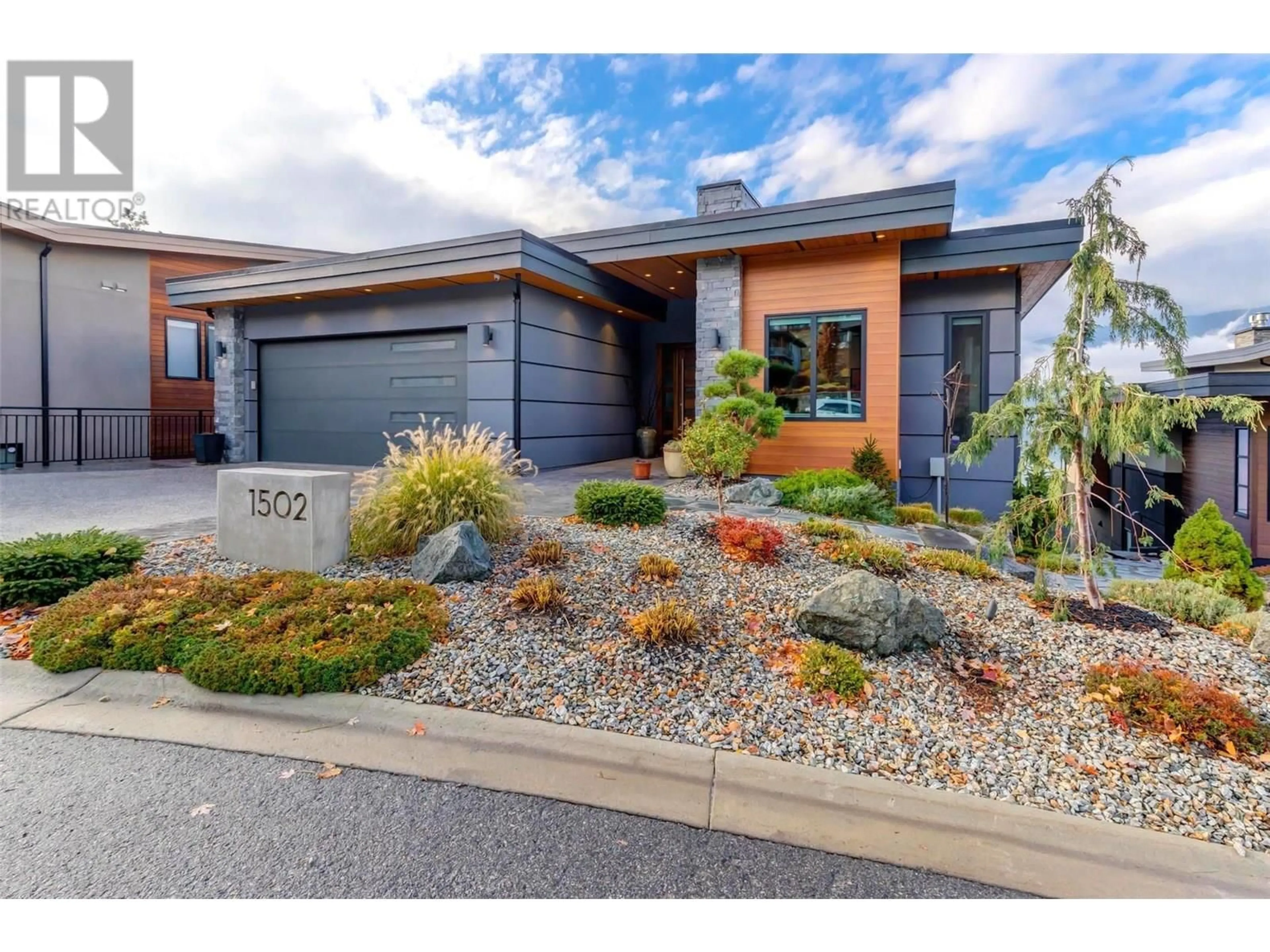 Home with brick exterior material, street for 1502 MARBLE LEDGE DRIVE, Lake Country British Columbia V4V2T4