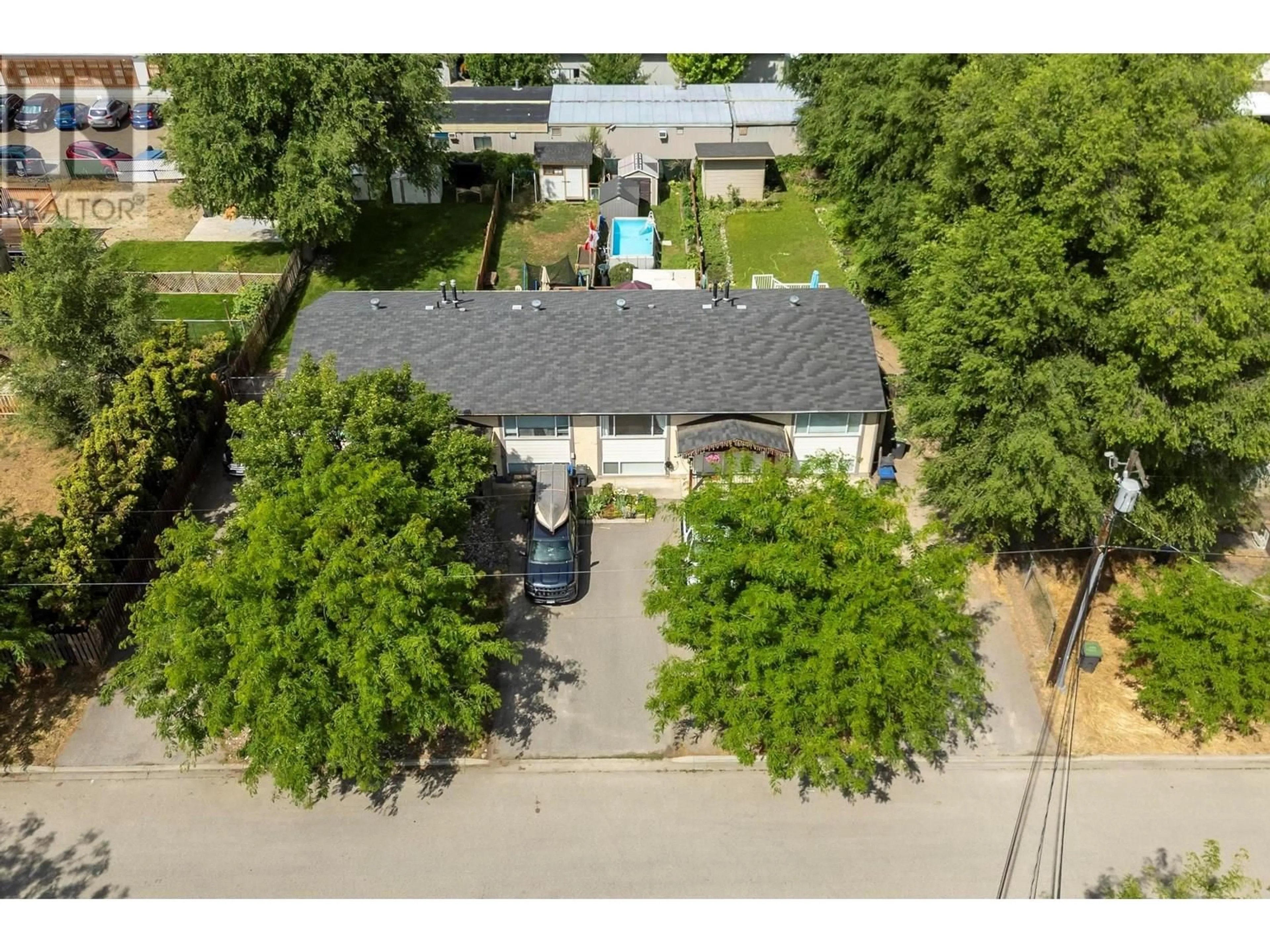 A pic from outside/outdoor area/front of a property/back of a property/a pic from drone, street for 364 HEIN ROAD, Kelowna British Columbia V1X4A3