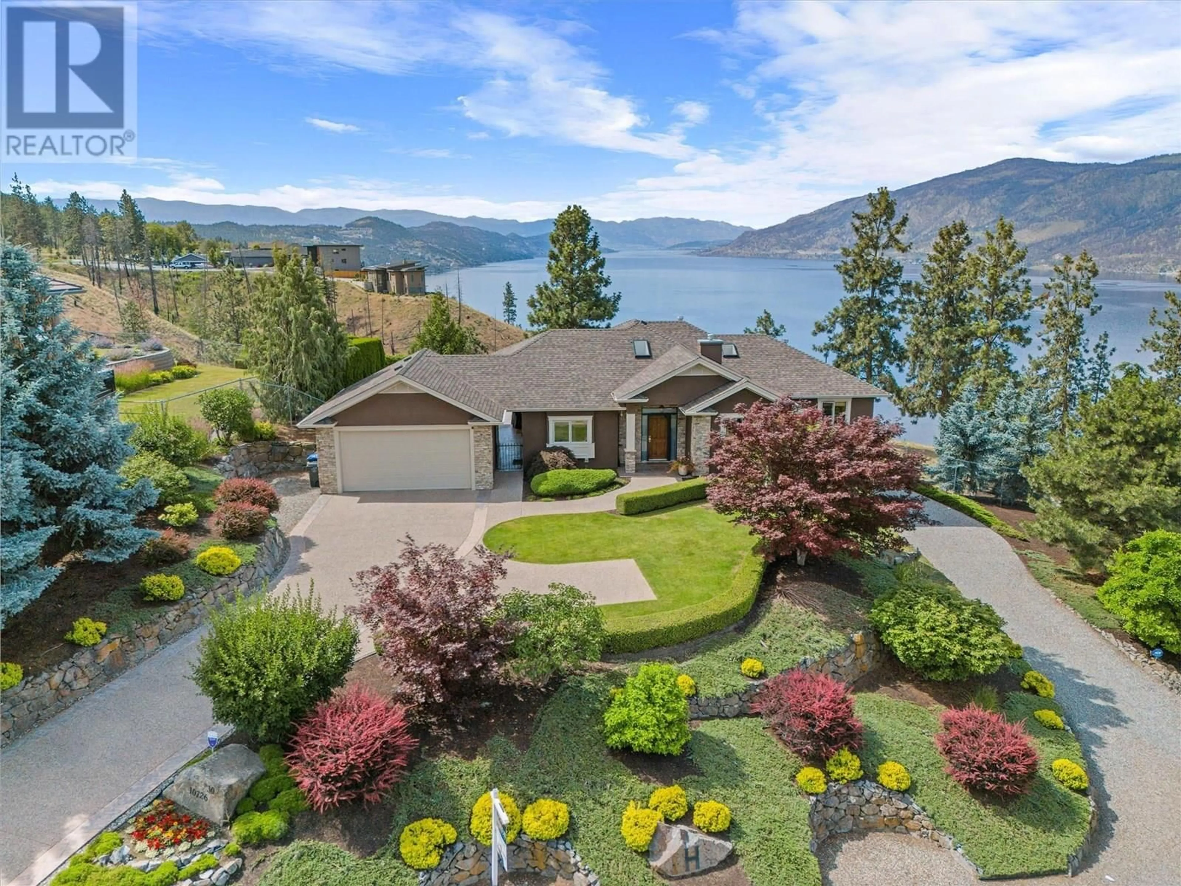 A pic from outside/outdoor area/front of a property/back of a property/a pic from drone, water/lake/river/ocean view for 30 - 10726 NIGHTHAWK ROAD, Lake Country British Columbia V4V2K7