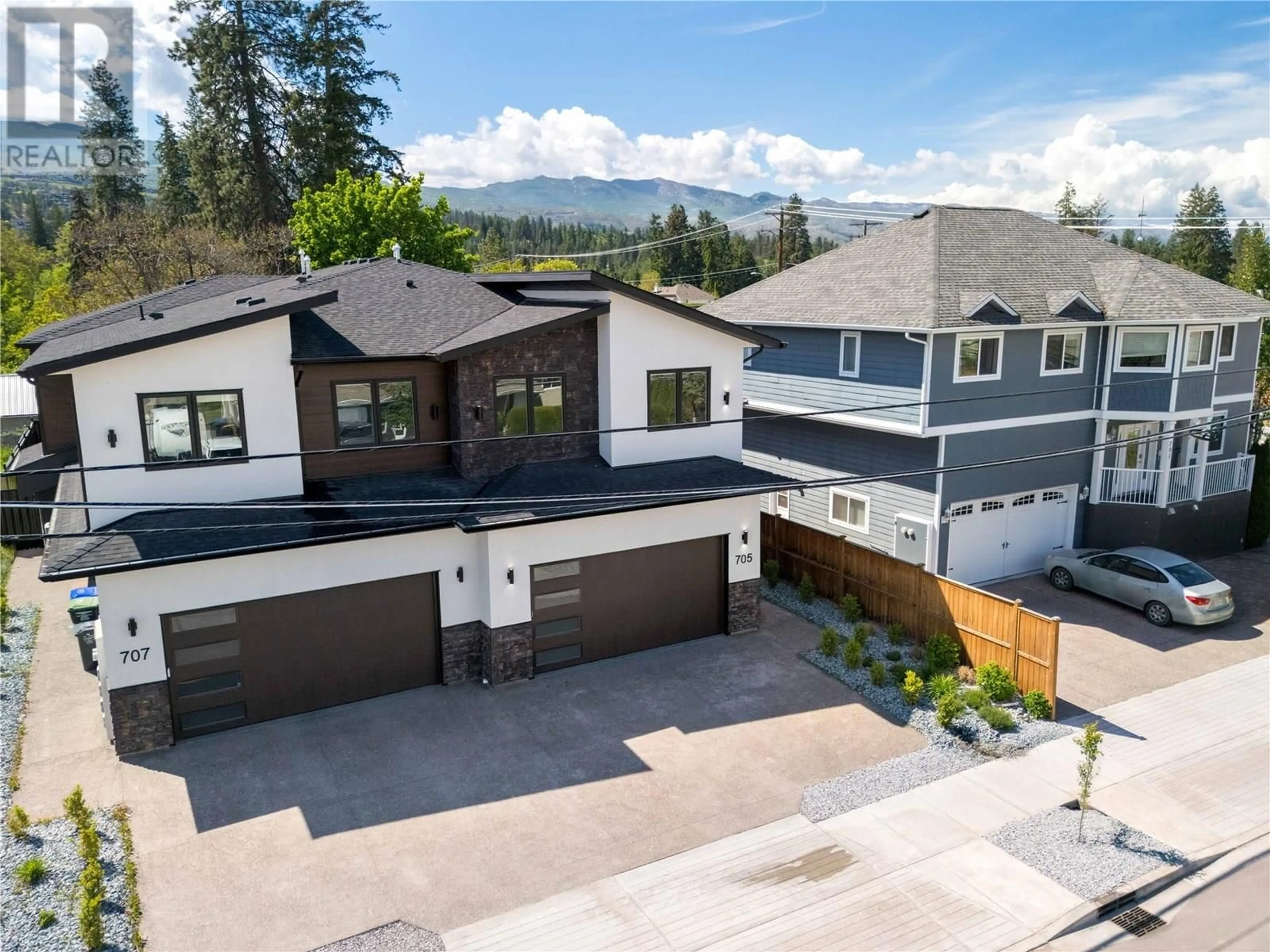 A pic from outside/outdoor area/front of a property/back of a property/a pic from drone, mountain view for 705 RAYMER ROAD, Kelowna British Columbia V1W1H6