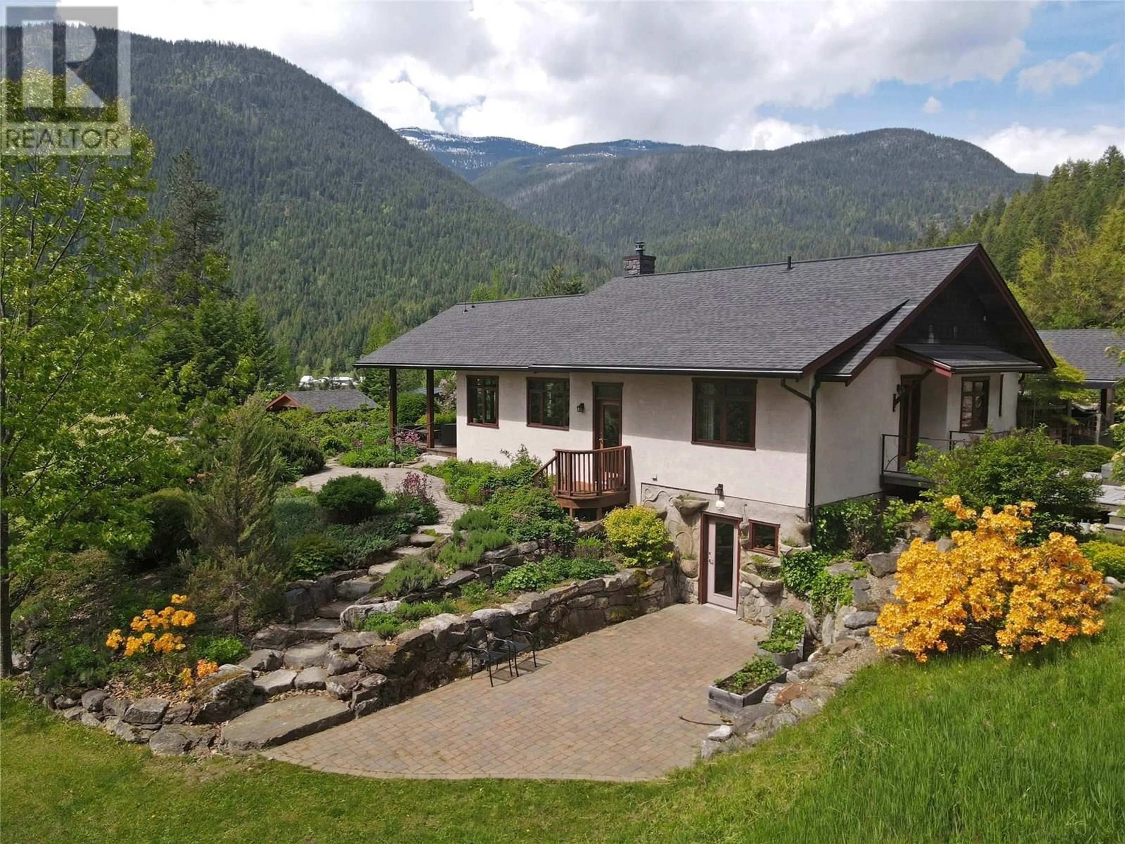 A pic from outside/outdoor area/front of a property/back of a property/a pic from drone, mountain view for 3092 POOHACHOFF ROAD, Slocan Park British Columbia V0G2E0
